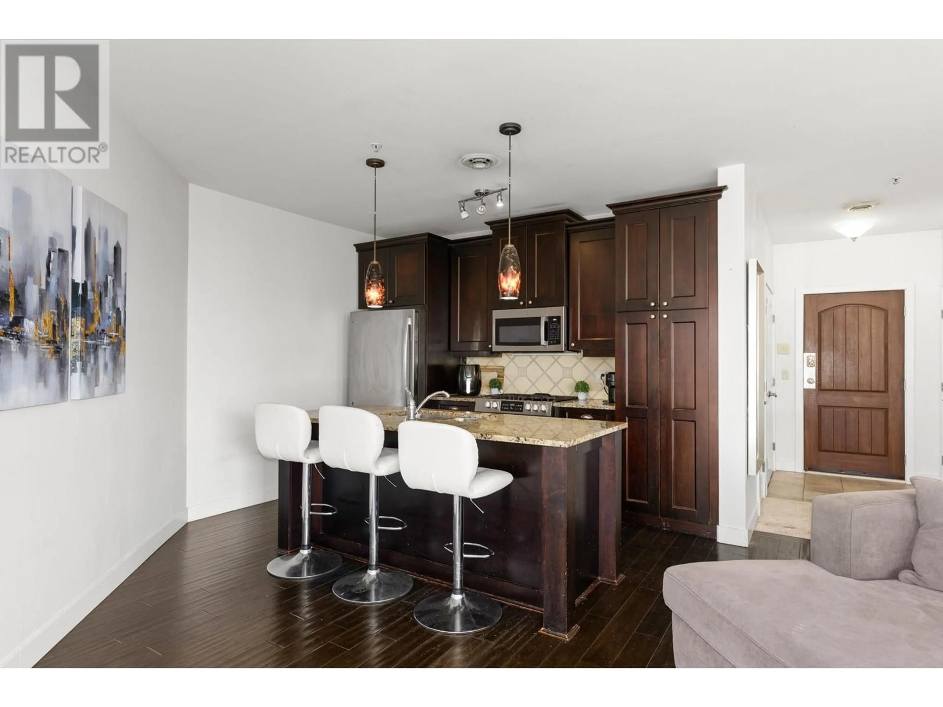 Open concept kitchen, wood/laminate floor for 2204 - 4042 PRITCHARD DRIVE NORTH, West Kelowna British Columbia V4T3E4