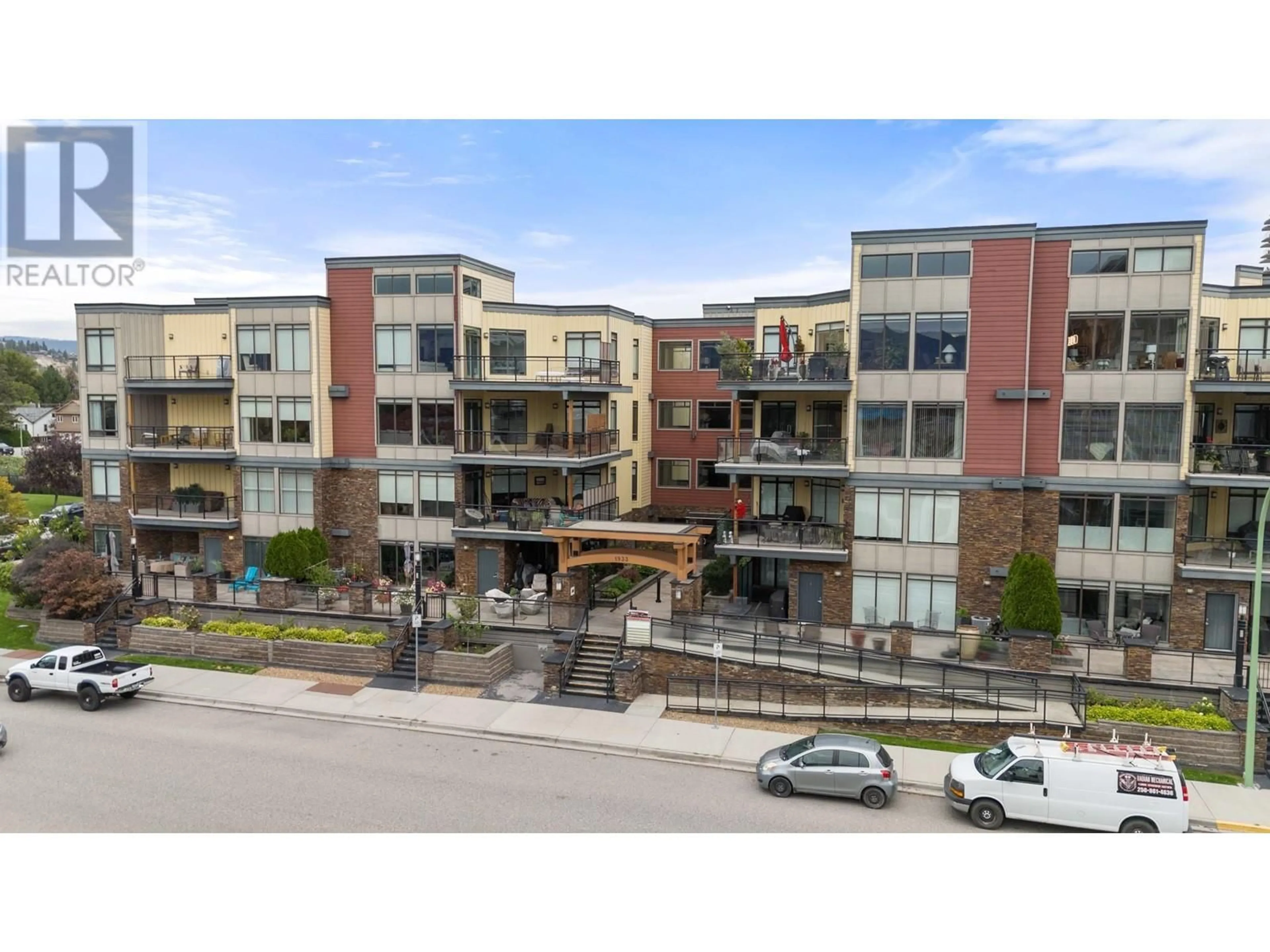 A pic from outside/outdoor area/front of a property/back of a property/a pic from drone, unknown for 302 - 1933 AMBROSI ROAD, Kelowna British Columbia V1Y4S1