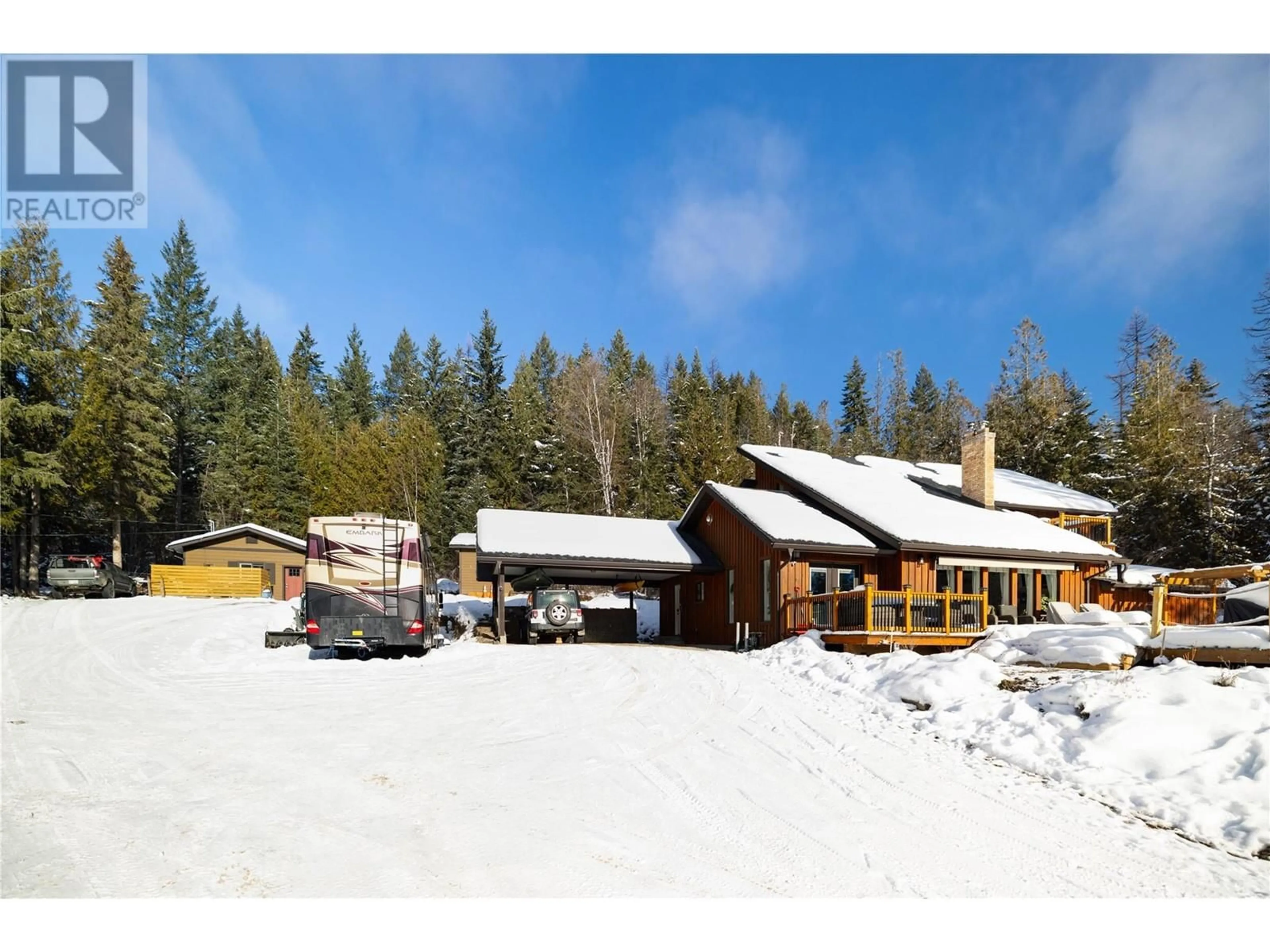 A pic from outside/outdoor area/front of a property/back of a property/a pic from drone, mountain view for 8329 Lincoln Road, Vernon British Columbia V1B3M8