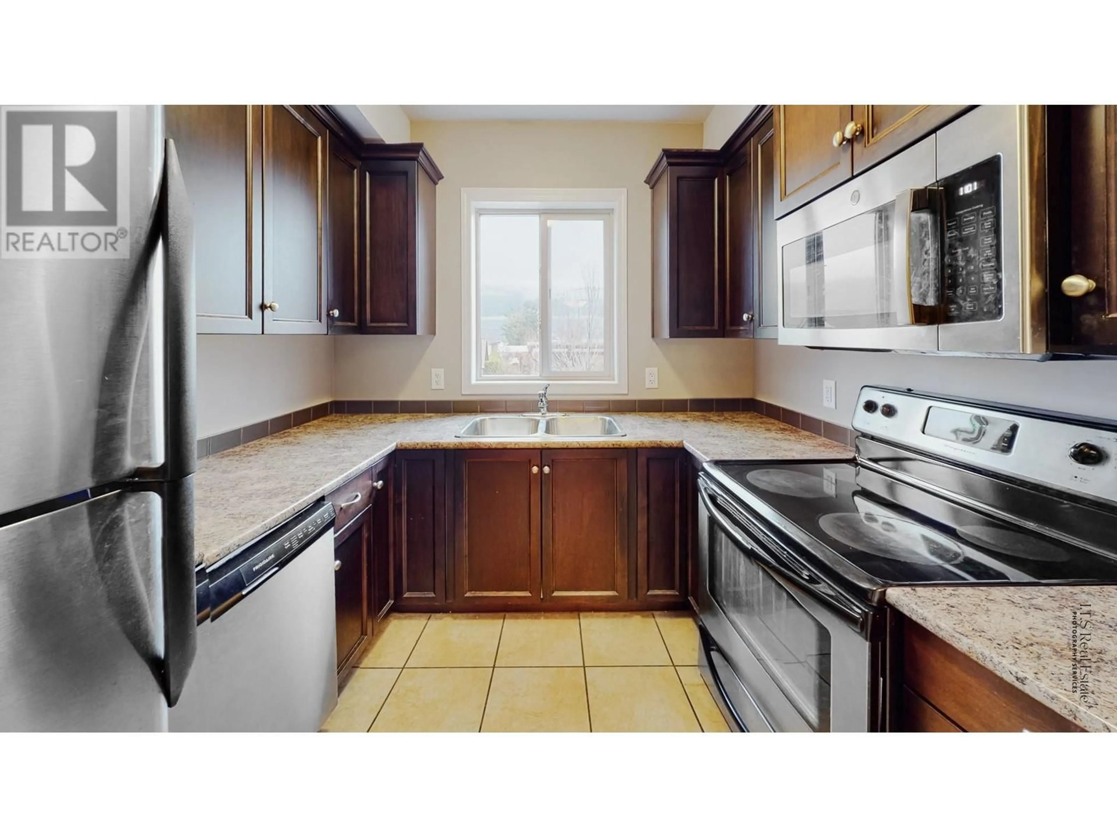 Standard kitchen, ceramic/tile floor for 4809 89TH Street Unit# 201, Osoyoos British Columbia V0H1V2