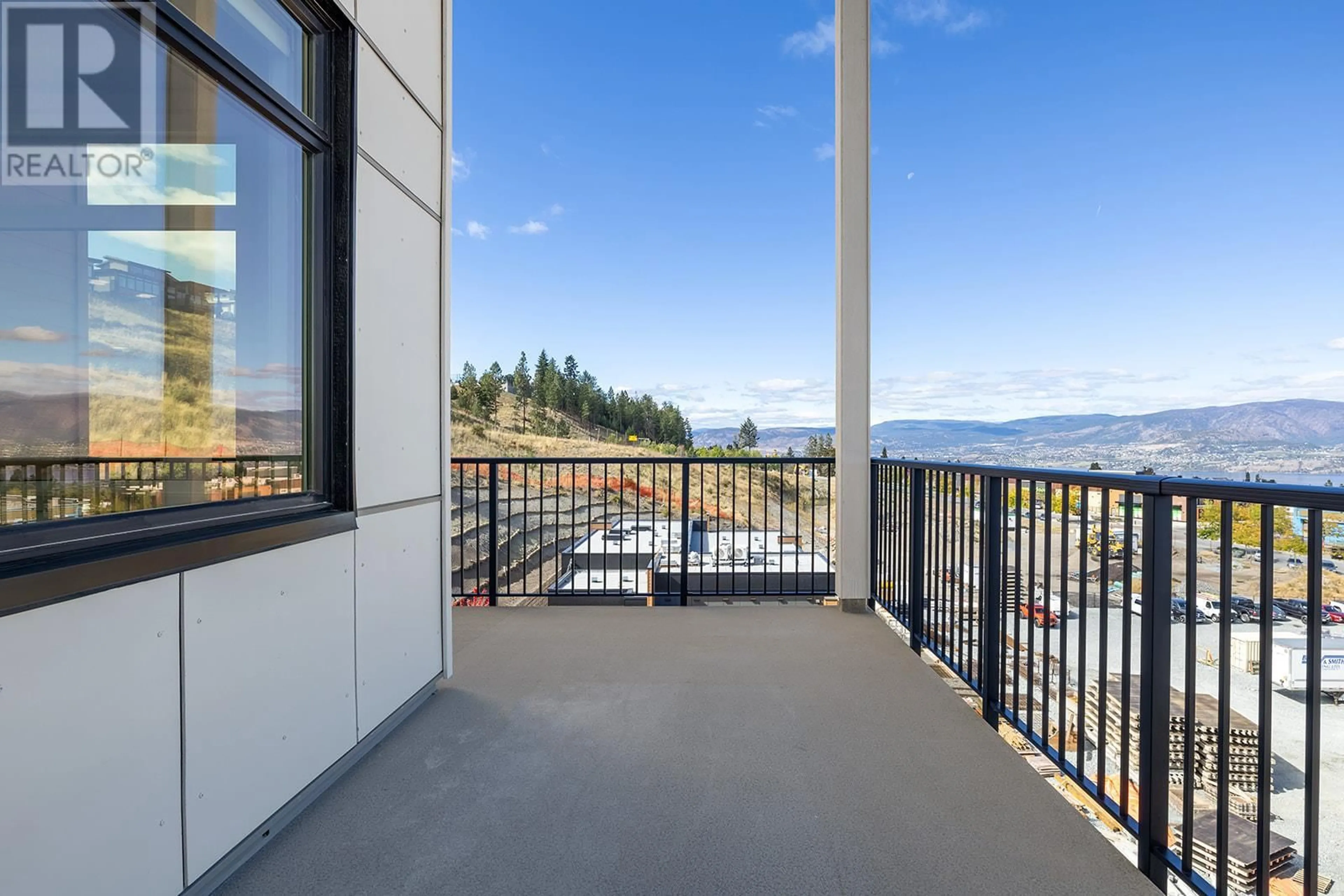 Patio, water/lake/river/ocean view for 1057 Frost Road Unit# 201, Kelowna British Columbia V1Y6G1