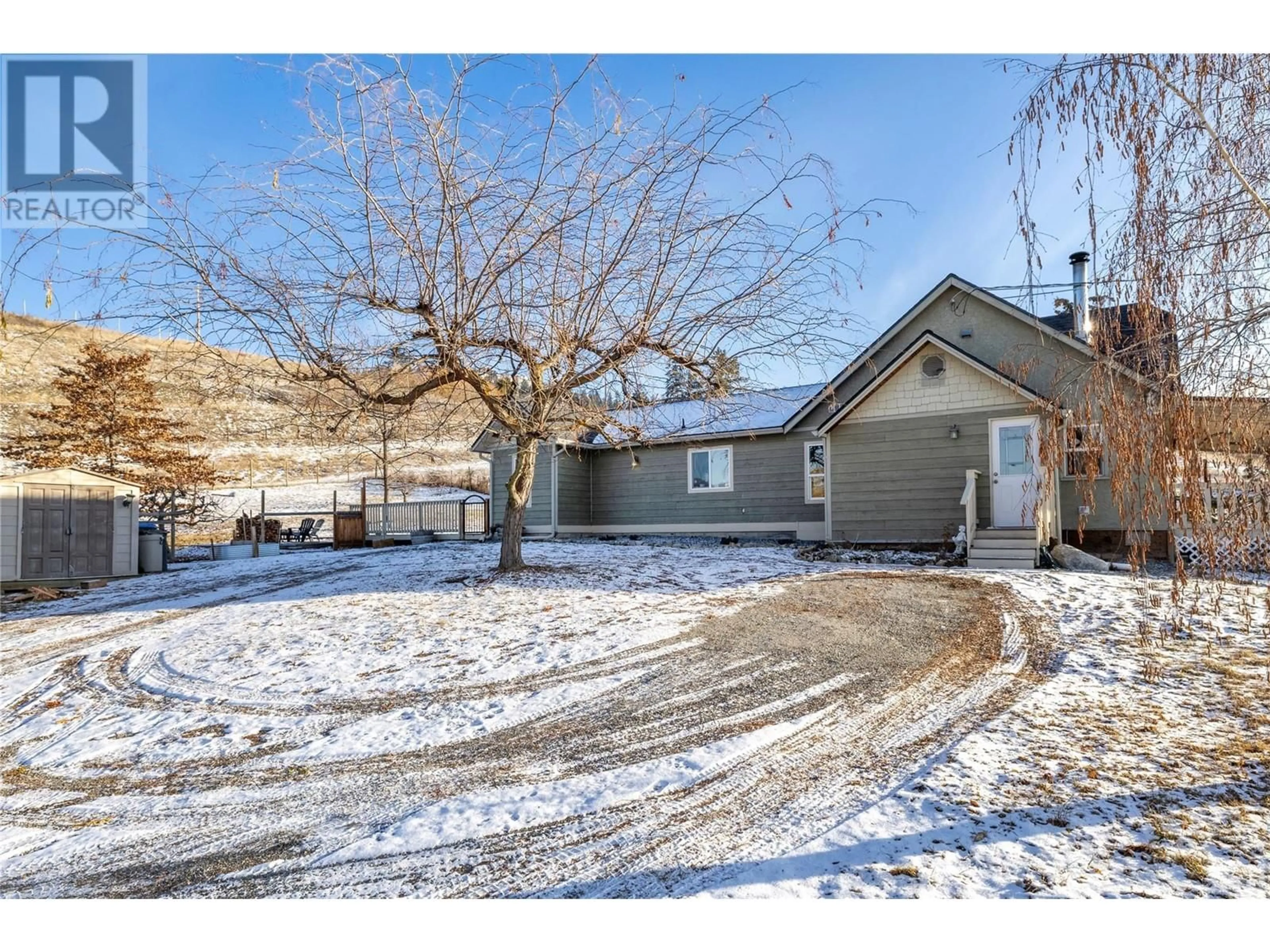 A pic from outside/outdoor area/front of a property/back of a property/a pic from drone, mountain view for 1155 MCKENZIE ROAD, Kelowna British Columbia V1P1C3