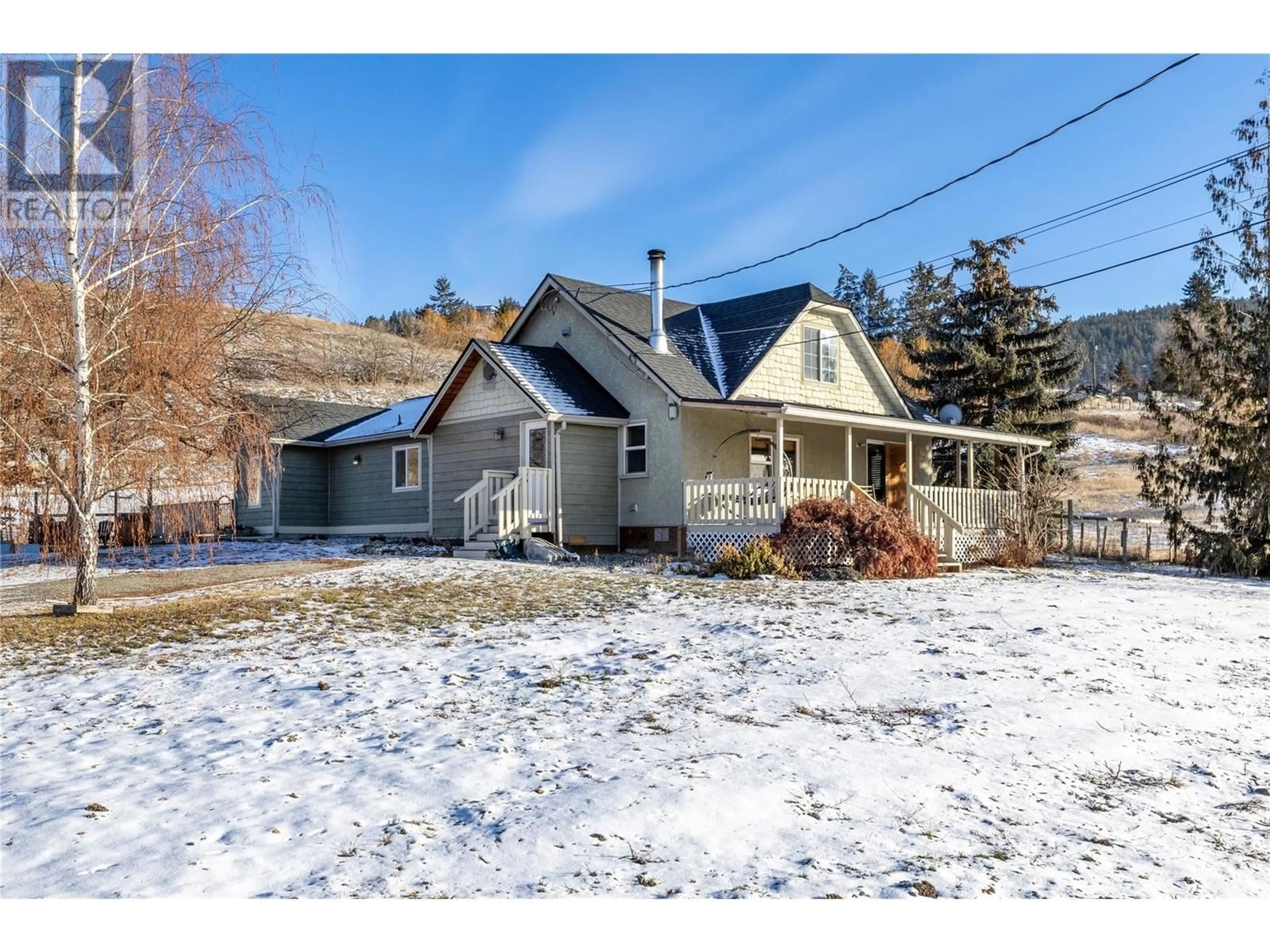 A pic from outside/outdoor area/front of a property/back of a property/a pic from drone, street for 1155 Mckenzie Road, Kelowna British Columbia V1P1C3