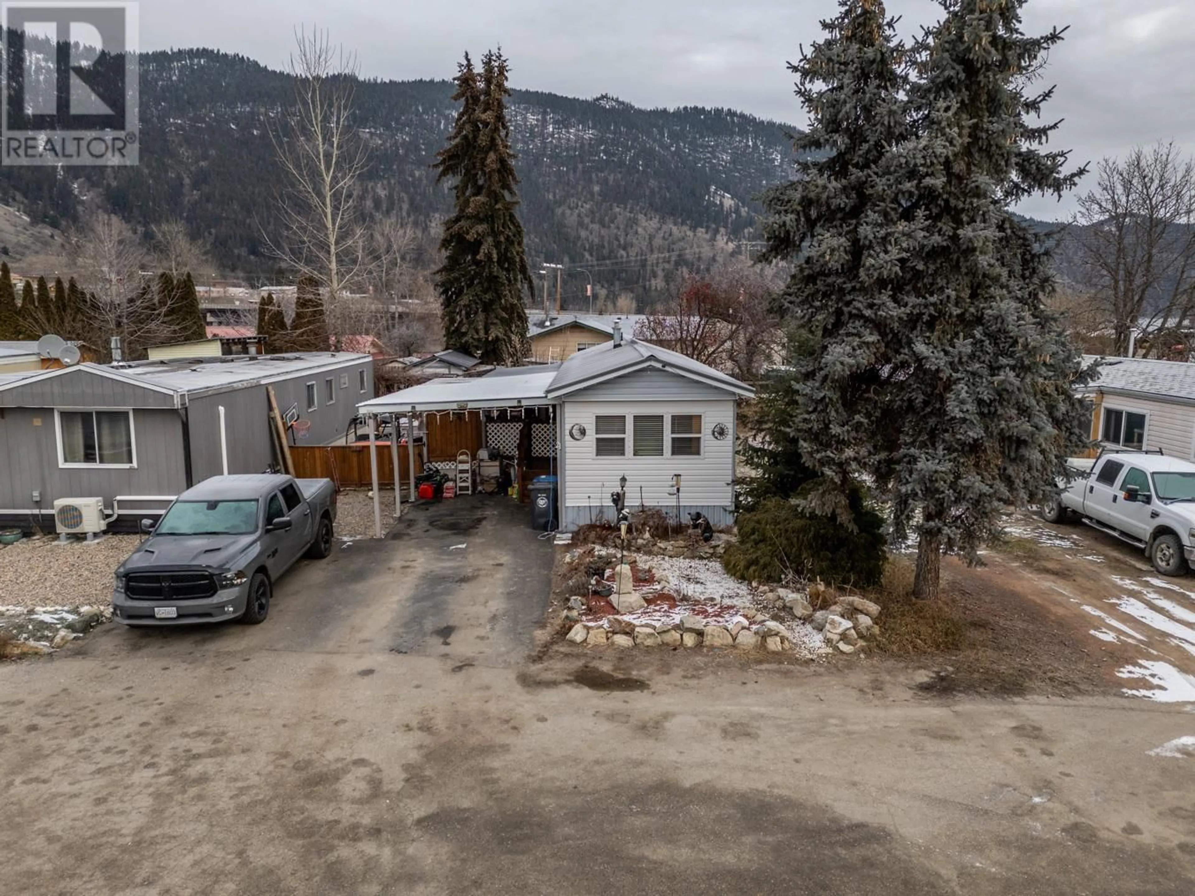 A pic from outside/outdoor area/front of a property/back of a property/a pic from drone, mountain view for 504 Pine Street Unit# 21, Chase British Columbia V0E1M0