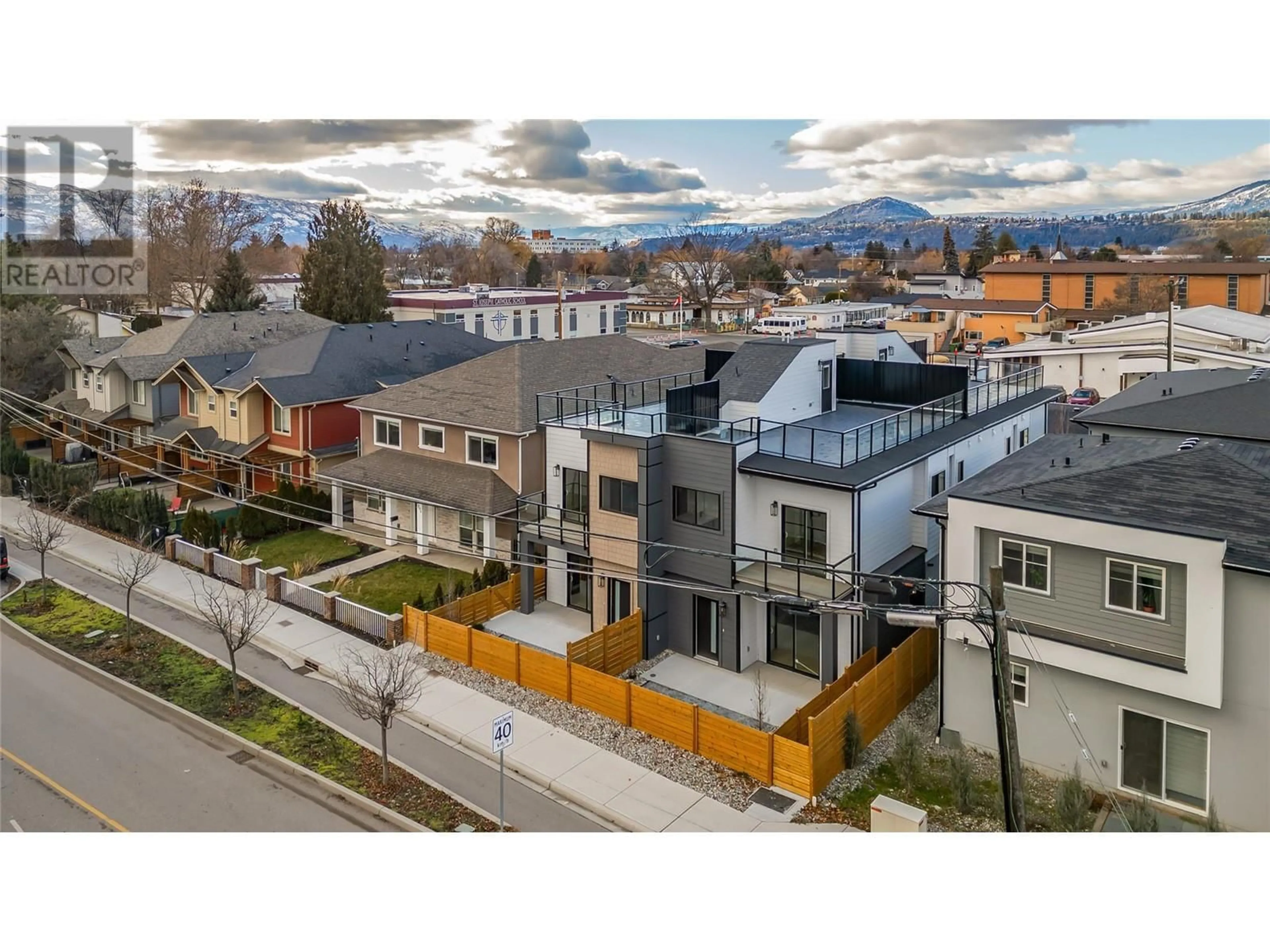 A pic from outside/outdoor area/front of a property/back of a property/a pic from drone, mountain view for 1916 Ethel Street Unit# 3, Kelowna British Columbia V1Y2Z5