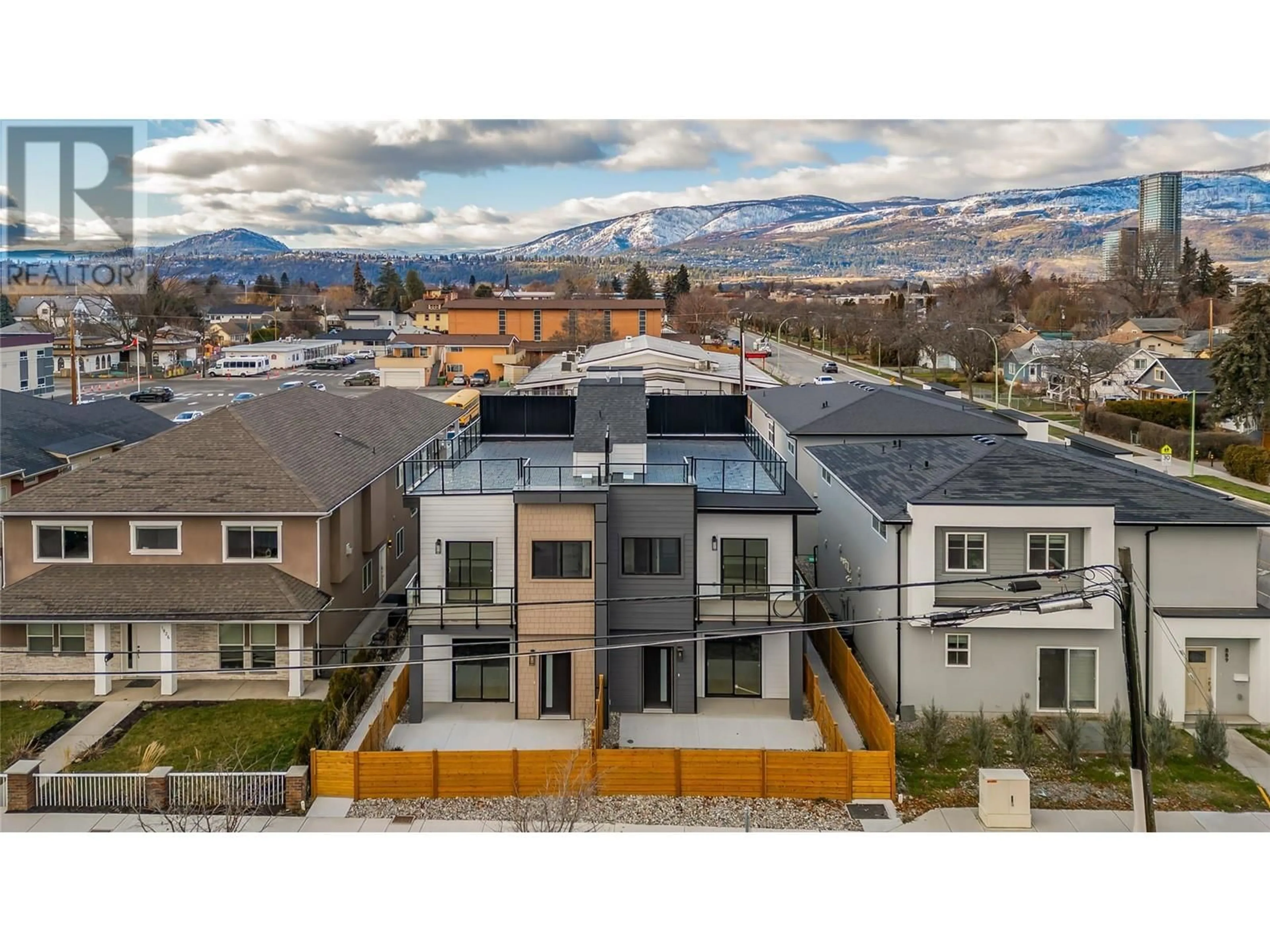 A pic from outside/outdoor area/front of a property/back of a property/a pic from drone, mountain view for 1916 Ethel Street Unit# 3, Kelowna British Columbia V1Y2Z5