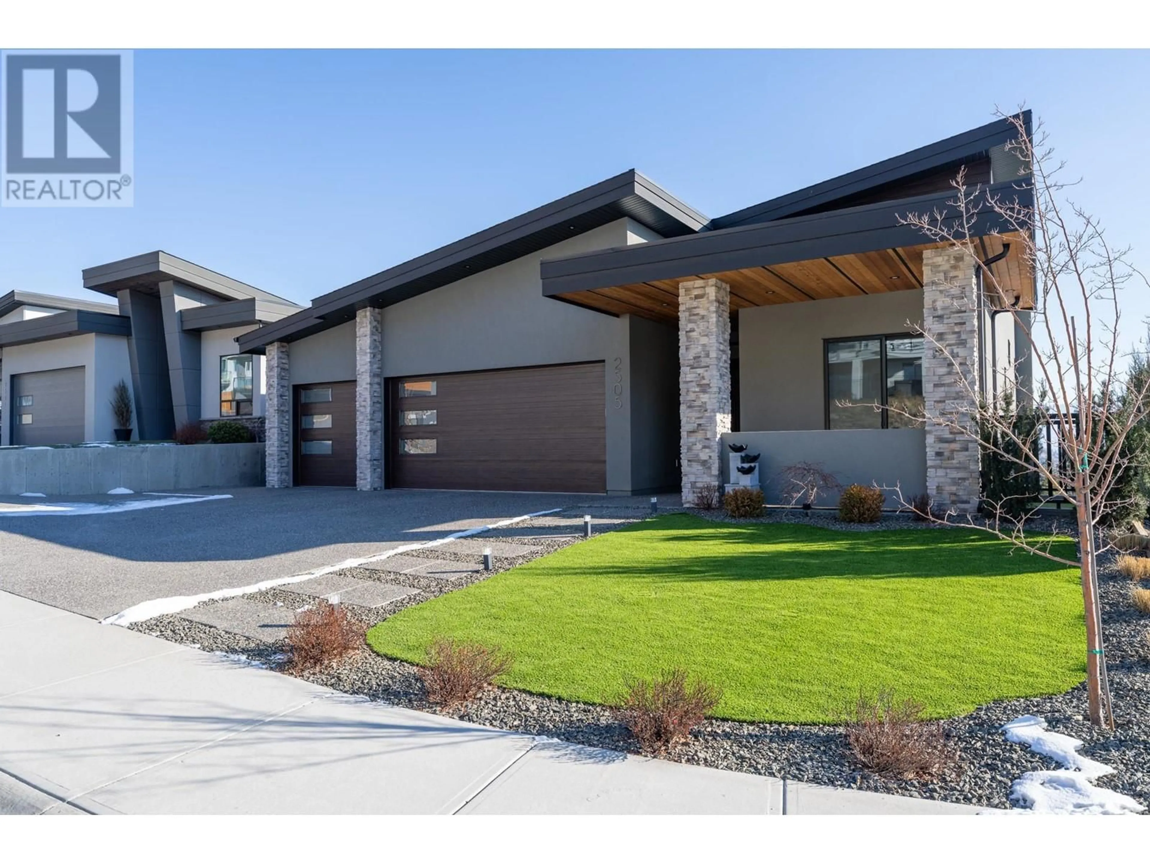 Home with brick exterior material, street for 2505 TALLUS HEIGHTS DRIVE, West Kelowna British Columbia V4T3M2
