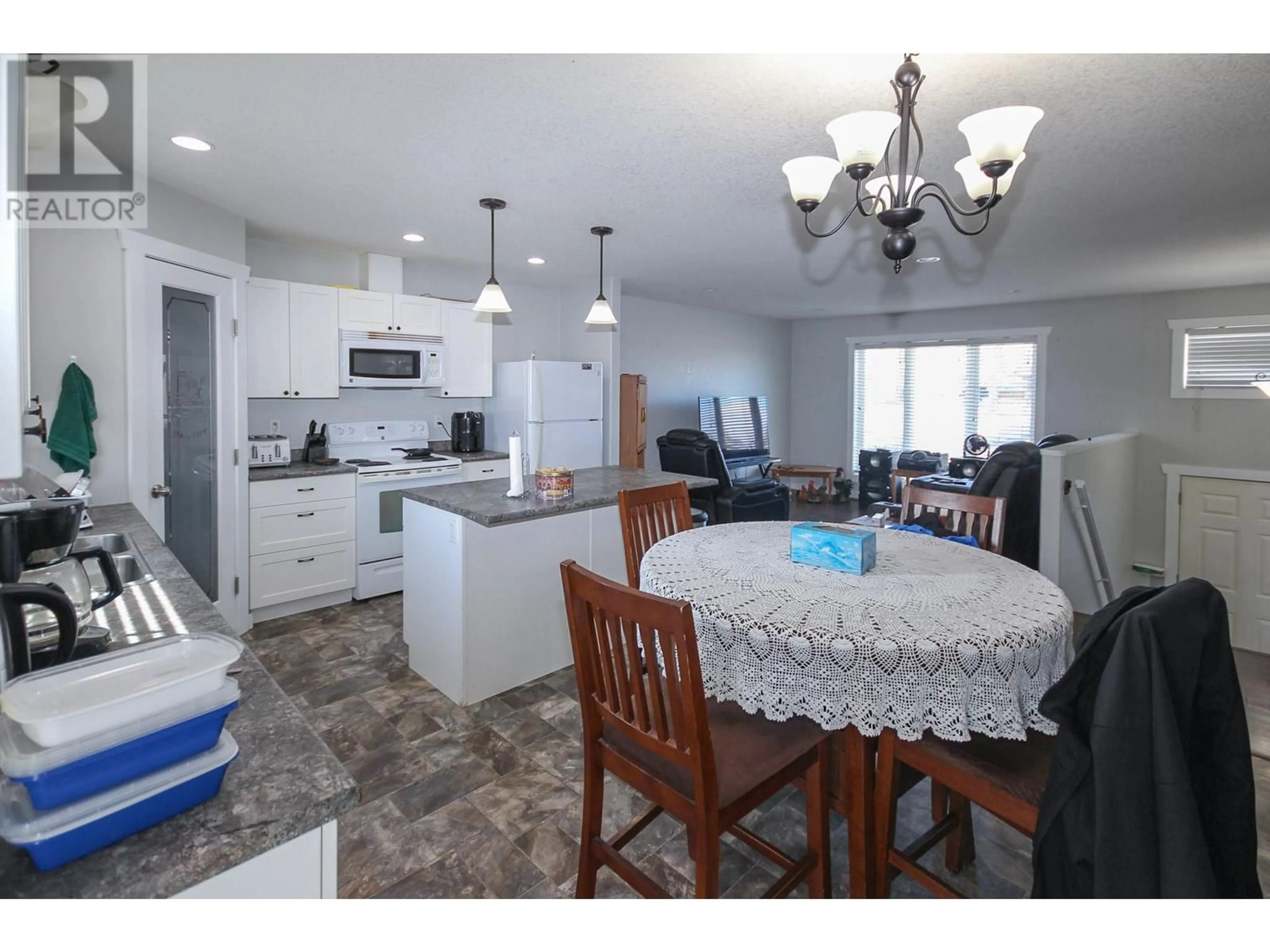 Open concept kitchen, ceramic/tile floor for 4803 56 AVENUE, Pouce Coupe British Columbia V0C2C0