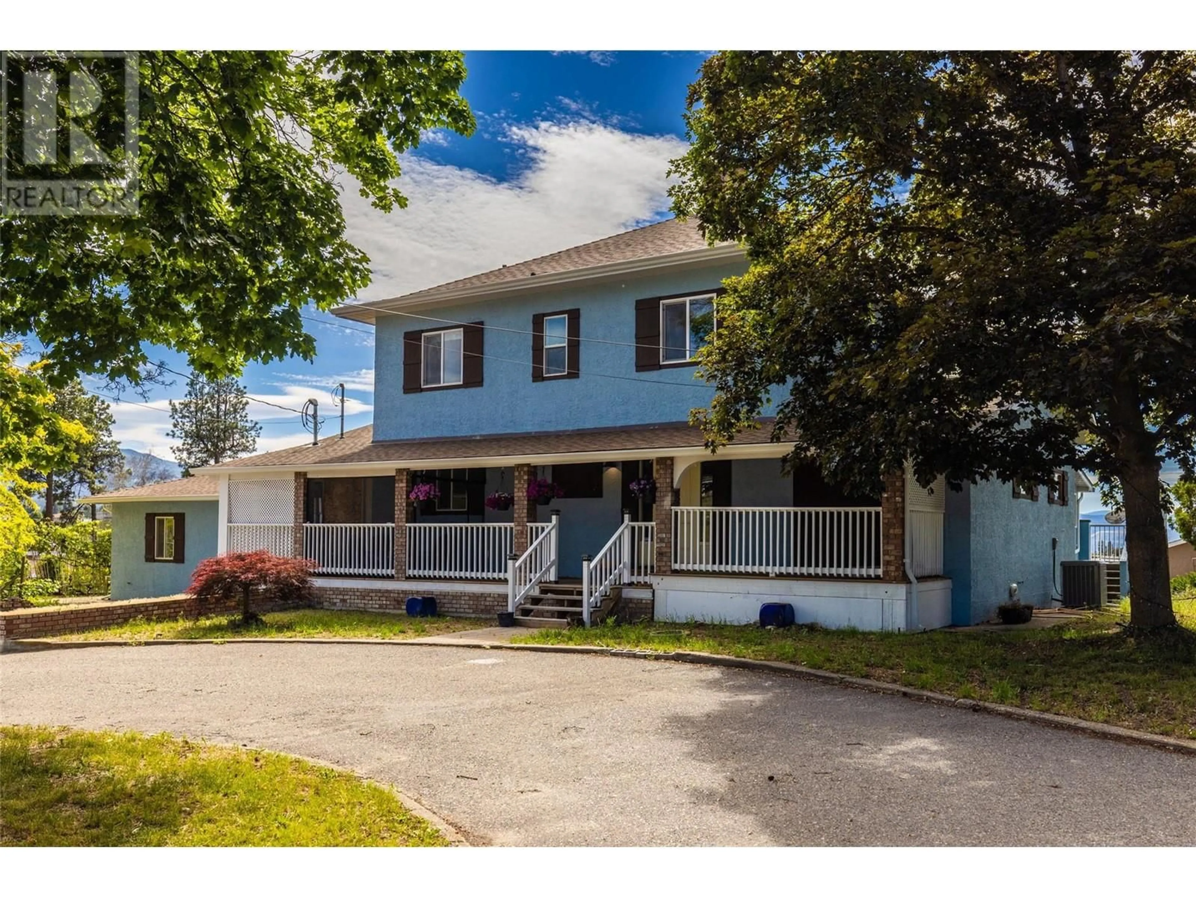 Home with vinyl exterior material, street for 3299 MCCULLOCH ROAD, Kelowna British Columbia V1W4G5