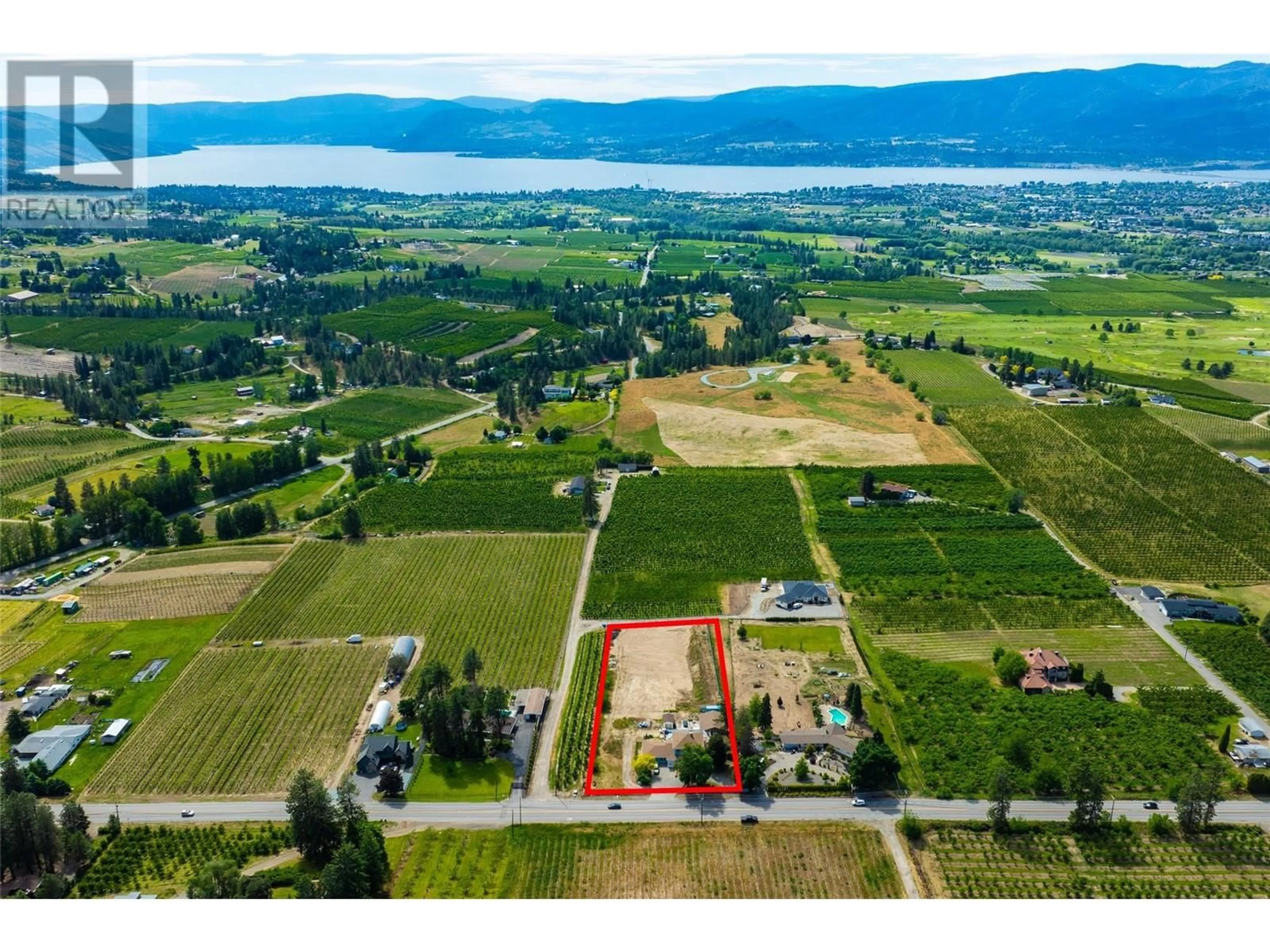 A pic from outside/outdoor area/front of a property/back of a property/a pic from drone, water/lake/river/ocean view for 3299 McCulloch Road, Kelowna British Columbia V1W4G5