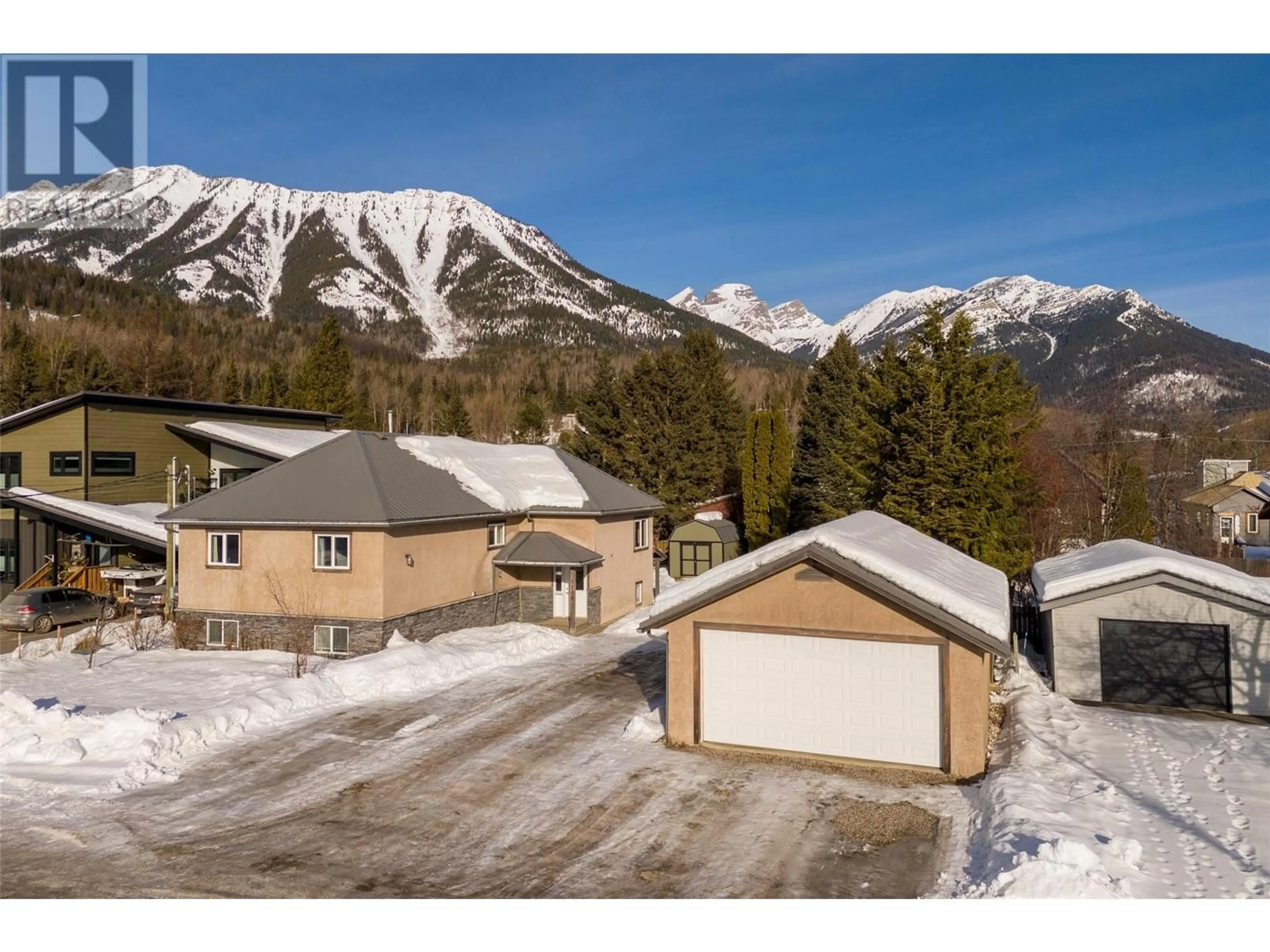 A pic from outside/outdoor area/front of a property/back of a property/a pic from drone, mountain view for 1189 MCLEOD Avenue, Fernie British Columbia V0B1M7