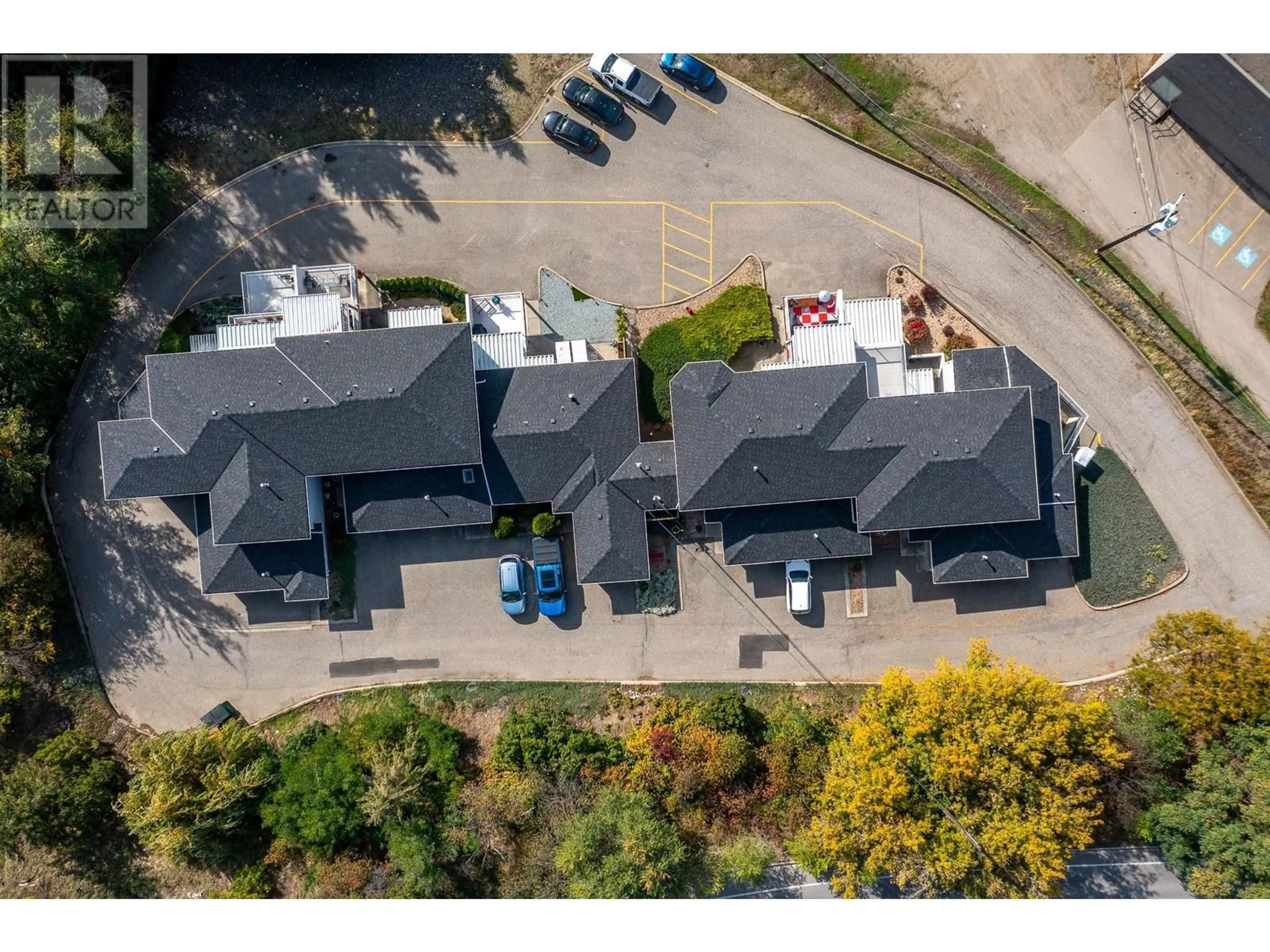 A pic from outside/outdoor area/front of a property/back of a property/a pic from drone, street for 4404 Pleasant Valley Road Unit# 3, Vernon British Columbia V1T4M3