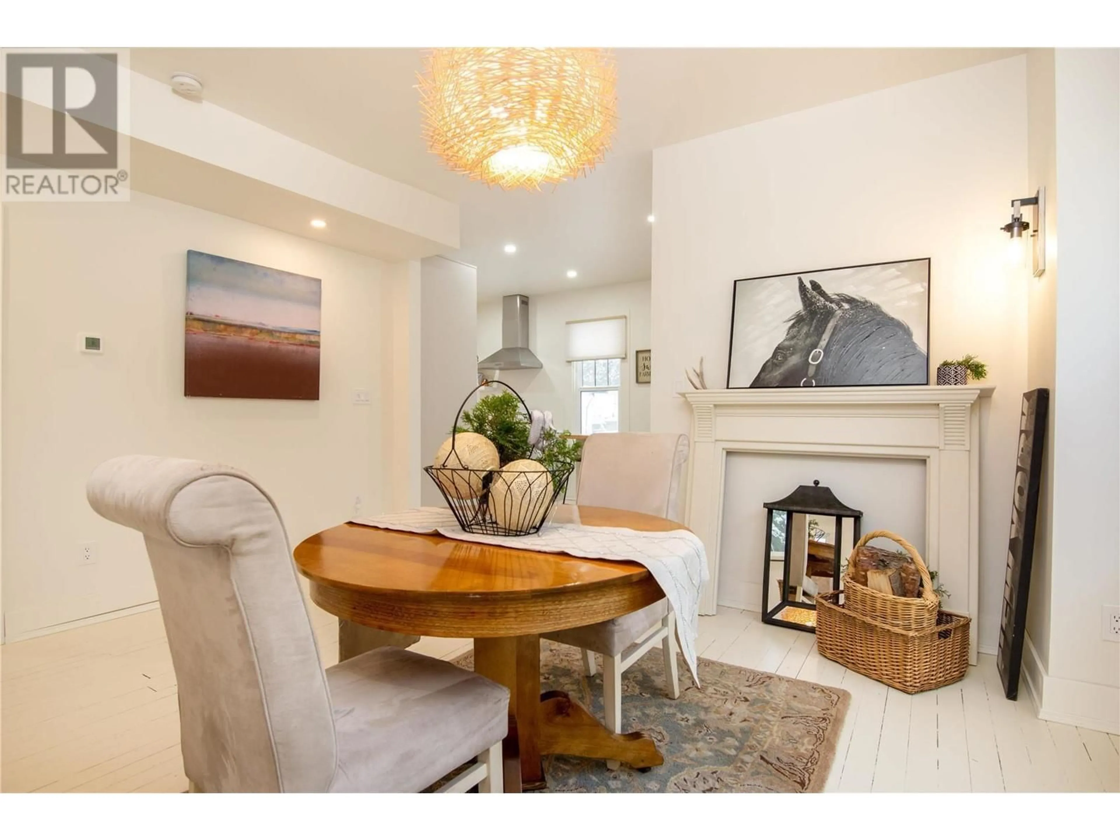 Dining room, wood/laminate floor for 2142 Shuswap Avenue, Lumby British Columbia V0E2G0