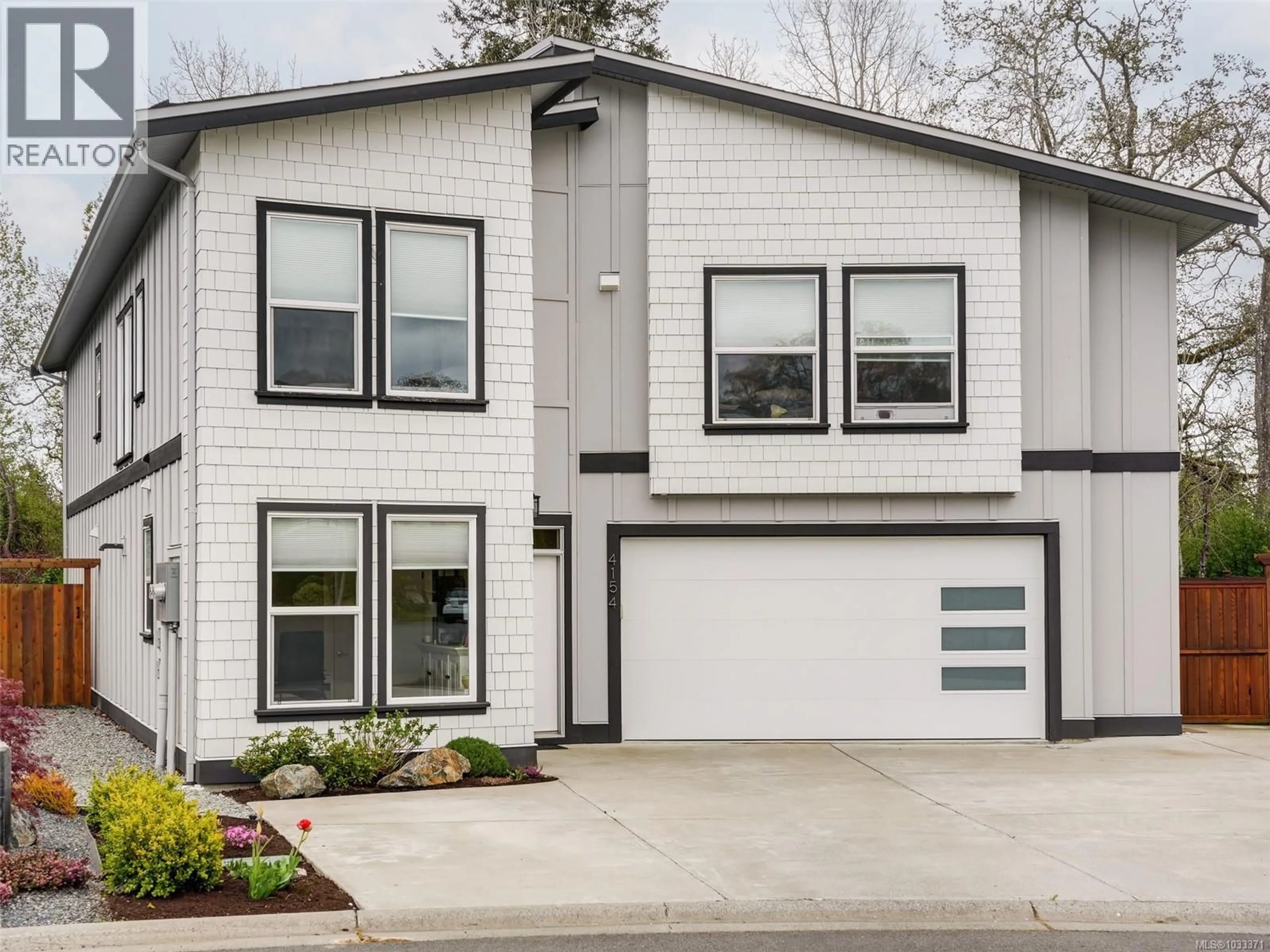 Home with brick exterior material, street for 4154 JAGAT PLACE, Saanich British Columbia V8X5H3