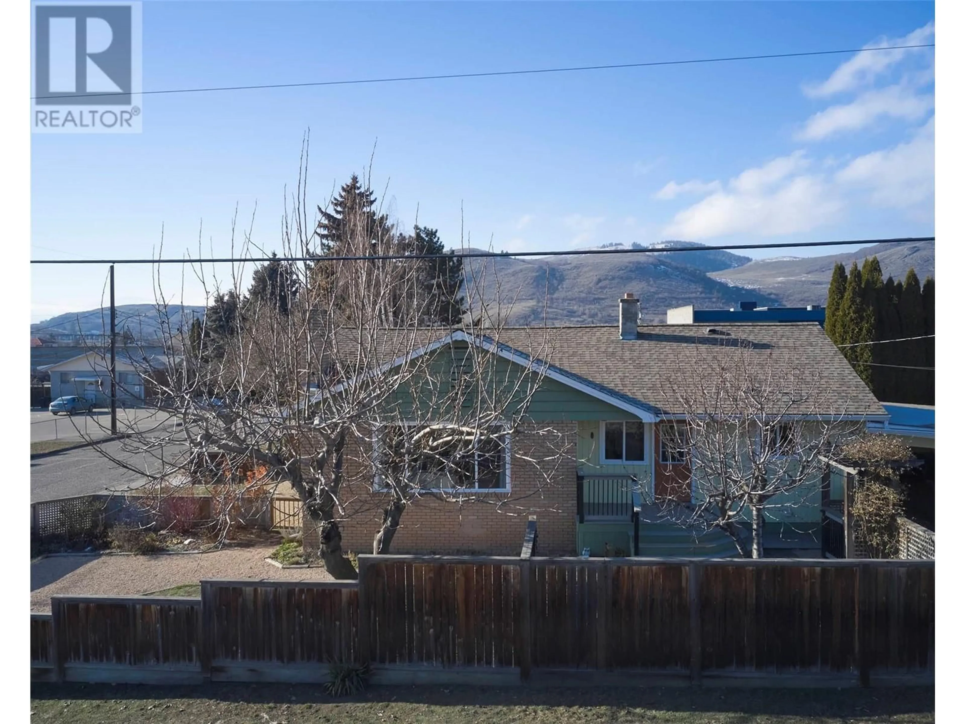 A pic from outside/outdoor area/front of a property/back of a property/a pic from drone, mountain view for 4400 25 Street, Vernon British Columbia V1T4S6