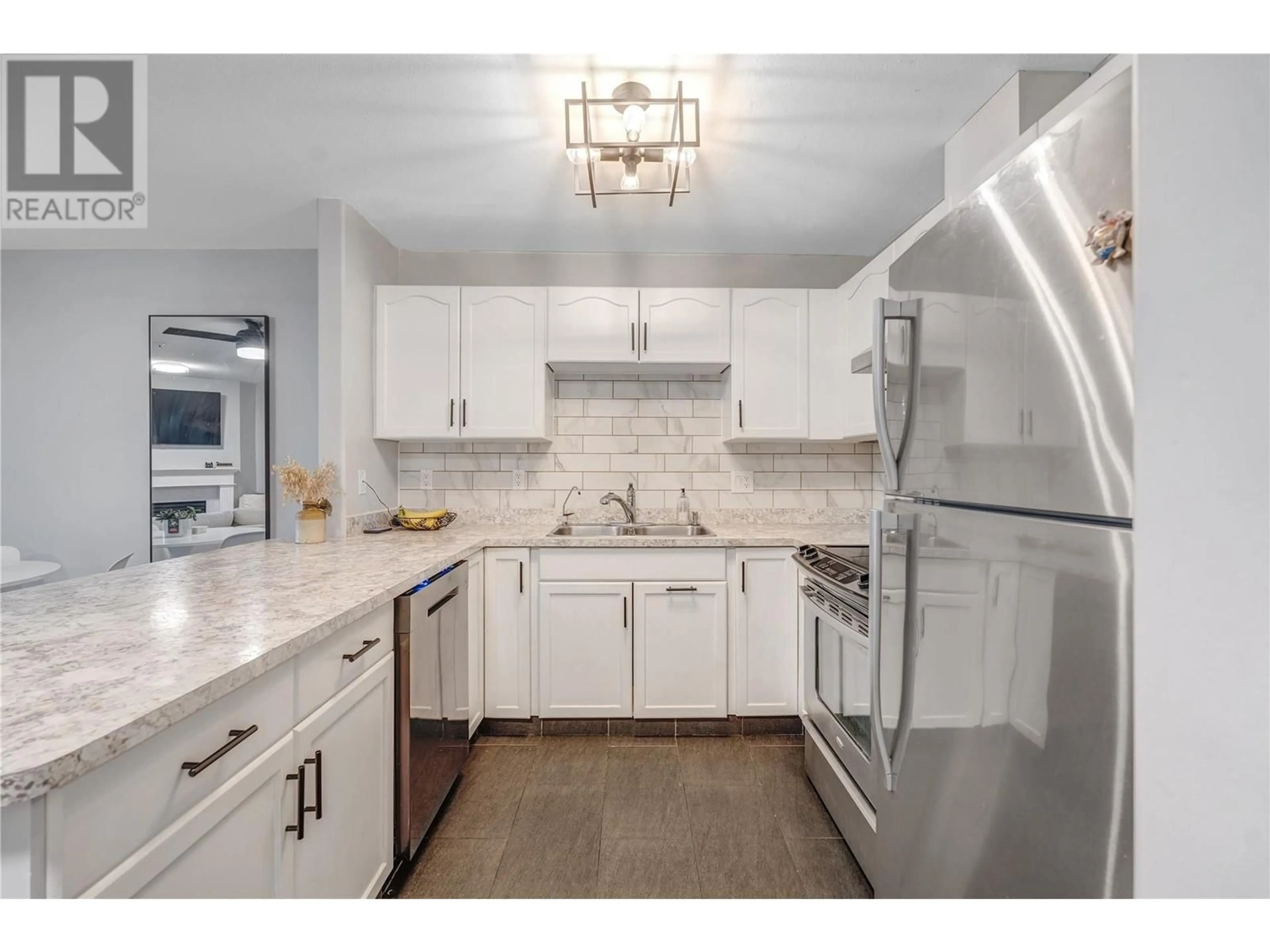 Open concept kitchen, ceramic/tile floor for 3310 Skaha Lake Road Unit# 205, Penticton British Columbia V2A6G4