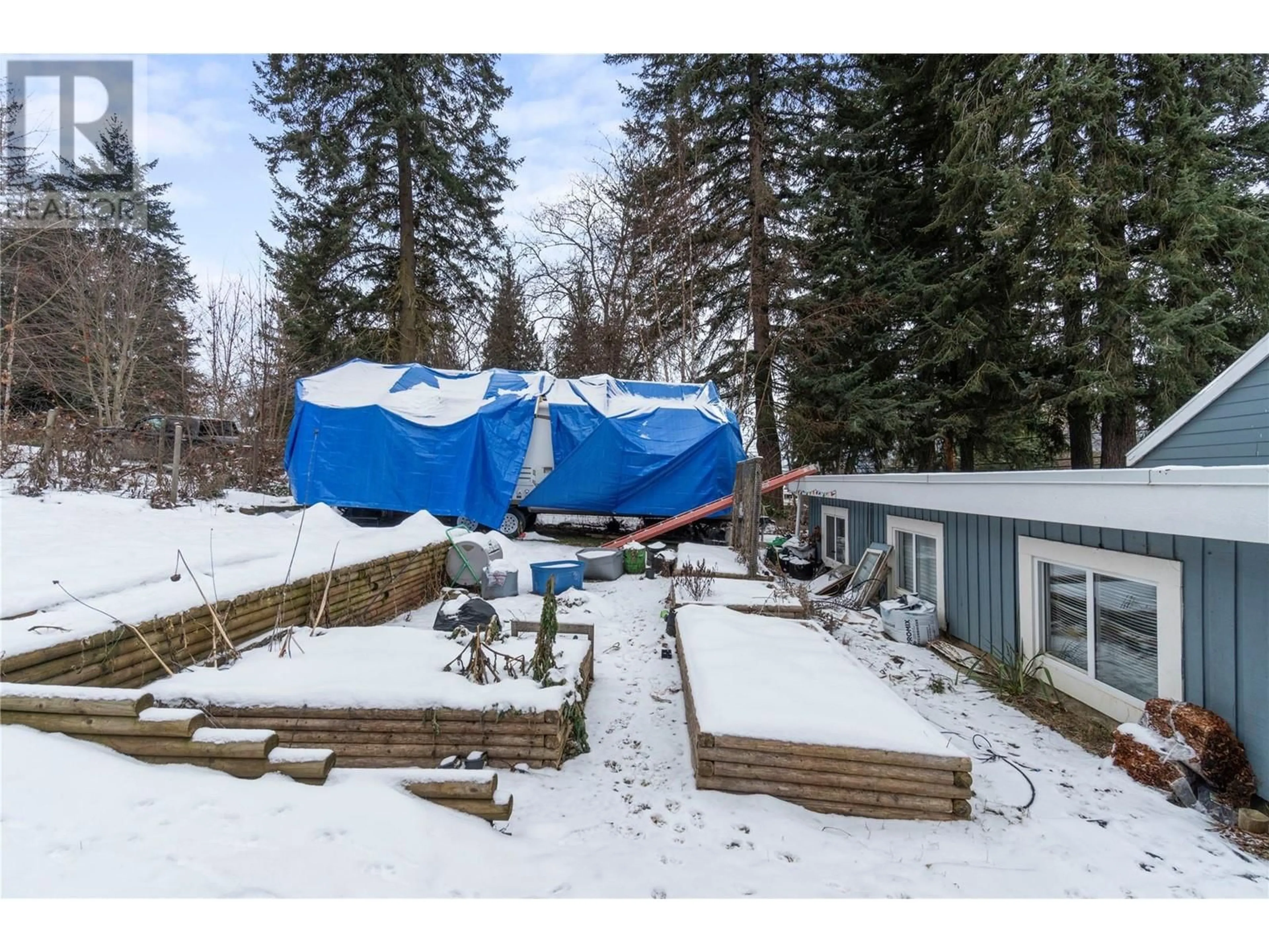 A pic from outside/outdoor area/front of a property/back of a property/a pic from drone, mountain view for 780 Foothill Road SW, Salmon Arm British Columbia V1E1T6