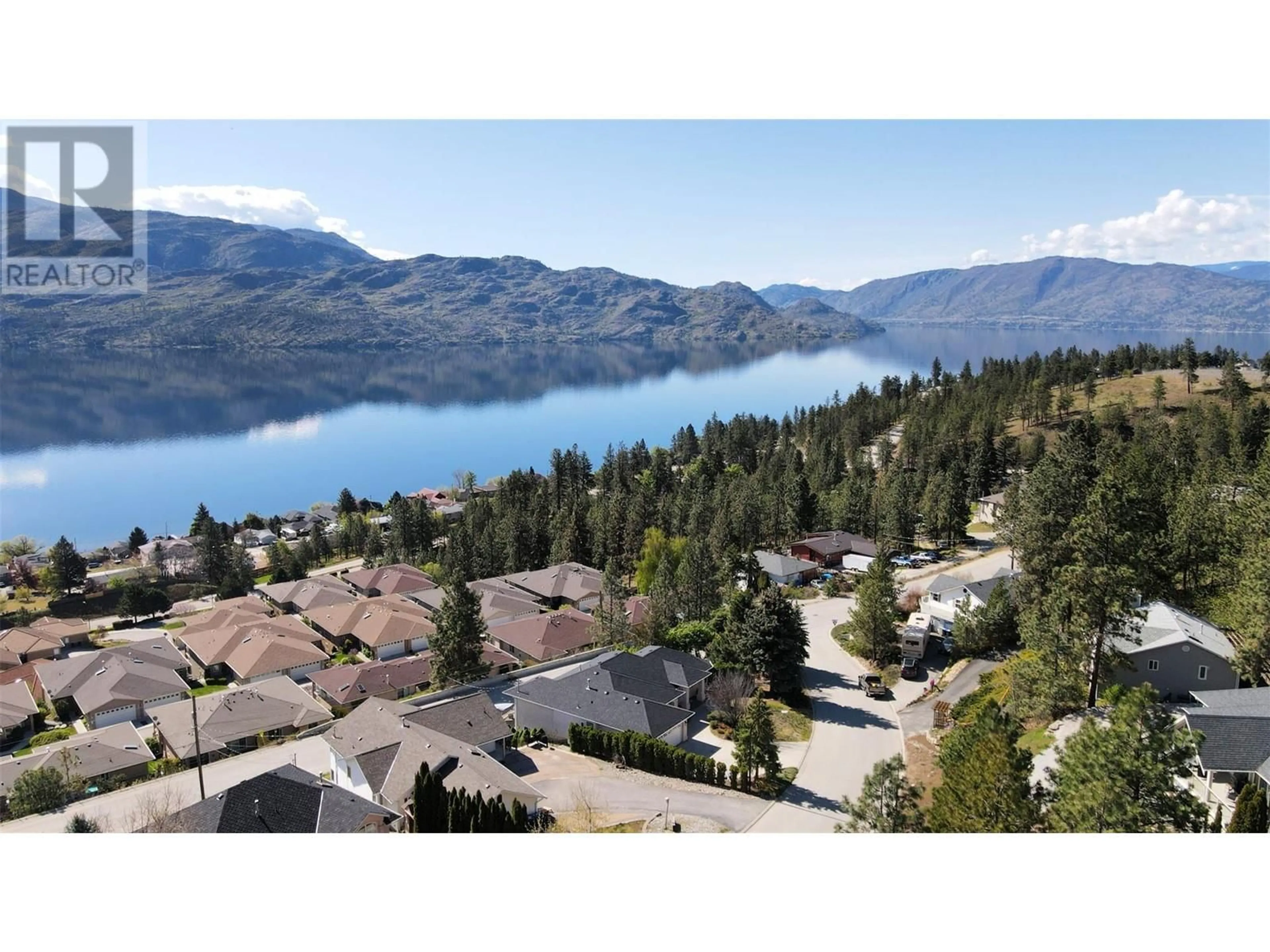 A pic from outside/outdoor area/front of a property/back of a property/a pic from drone, water/lake/river/ocean view for 5227 Trepanier Bench Road, Peachland British Columbia V0H1X2