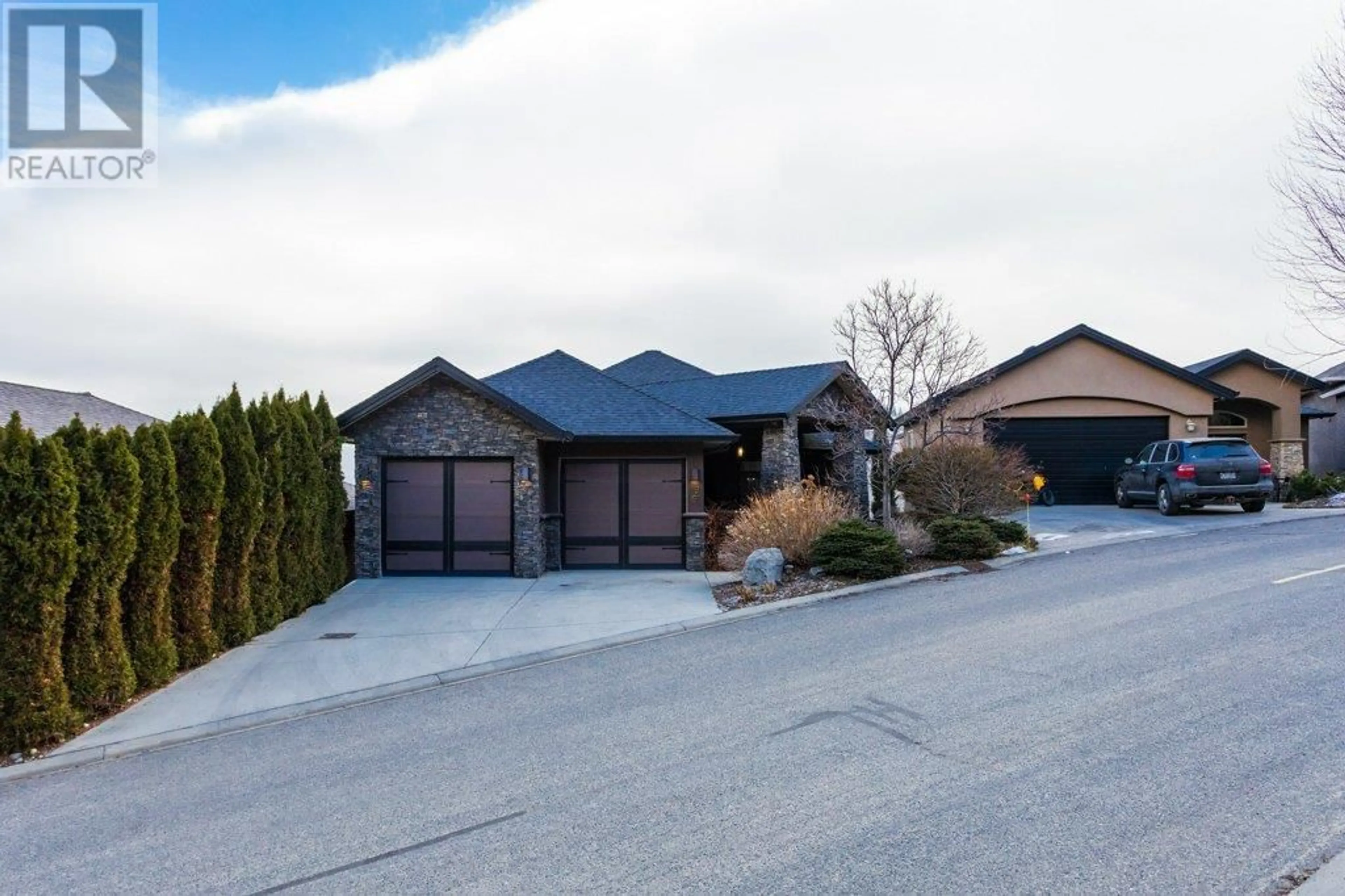 Home with brick exterior material, street for 1961 Cornerstone Drive, West Kelowna British Columbia V4T2Y3