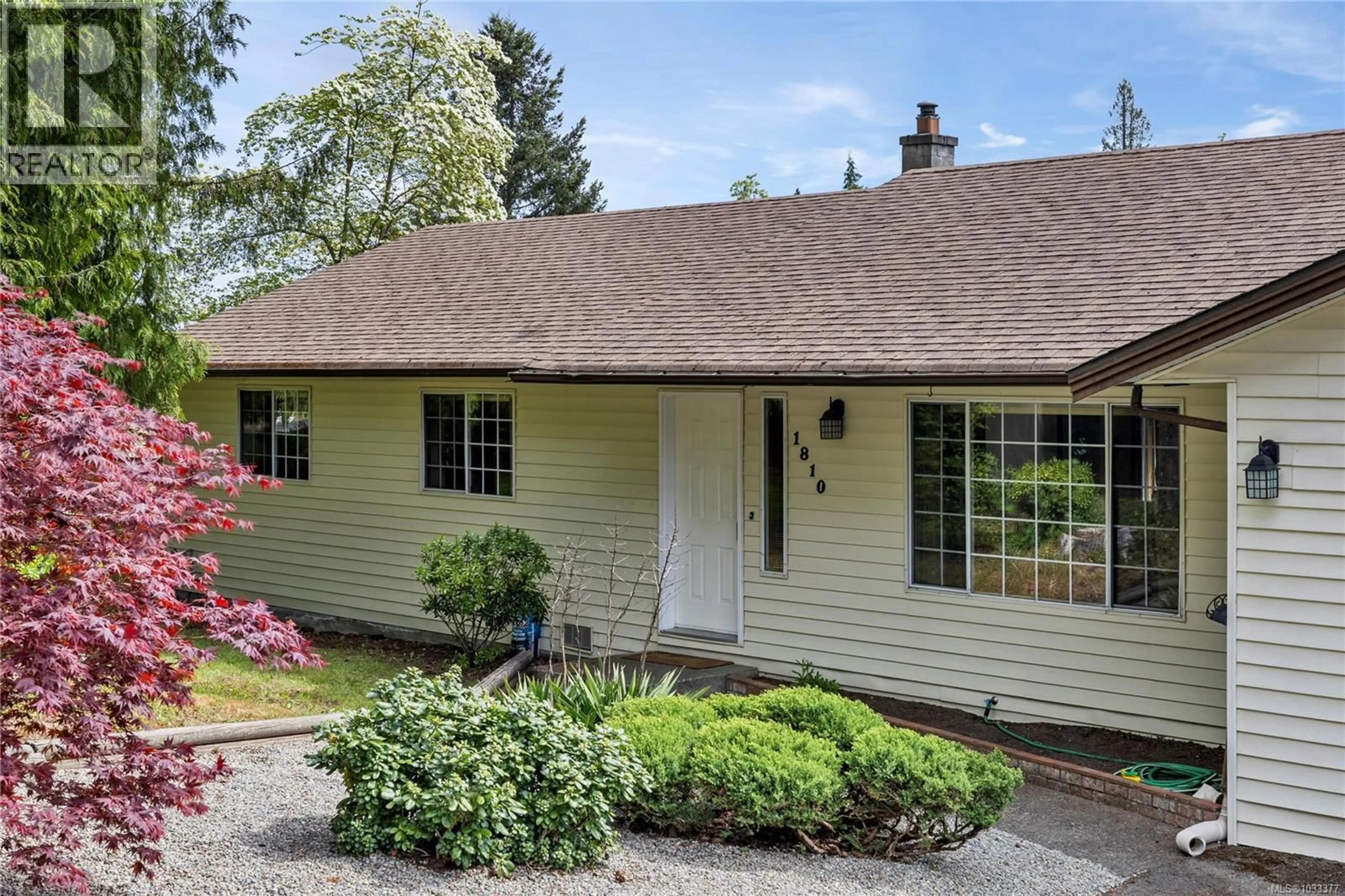 Home with vinyl exterior material, street for 1810 EXTENSION ROAD, Nanaimo British Columbia V9X1C9