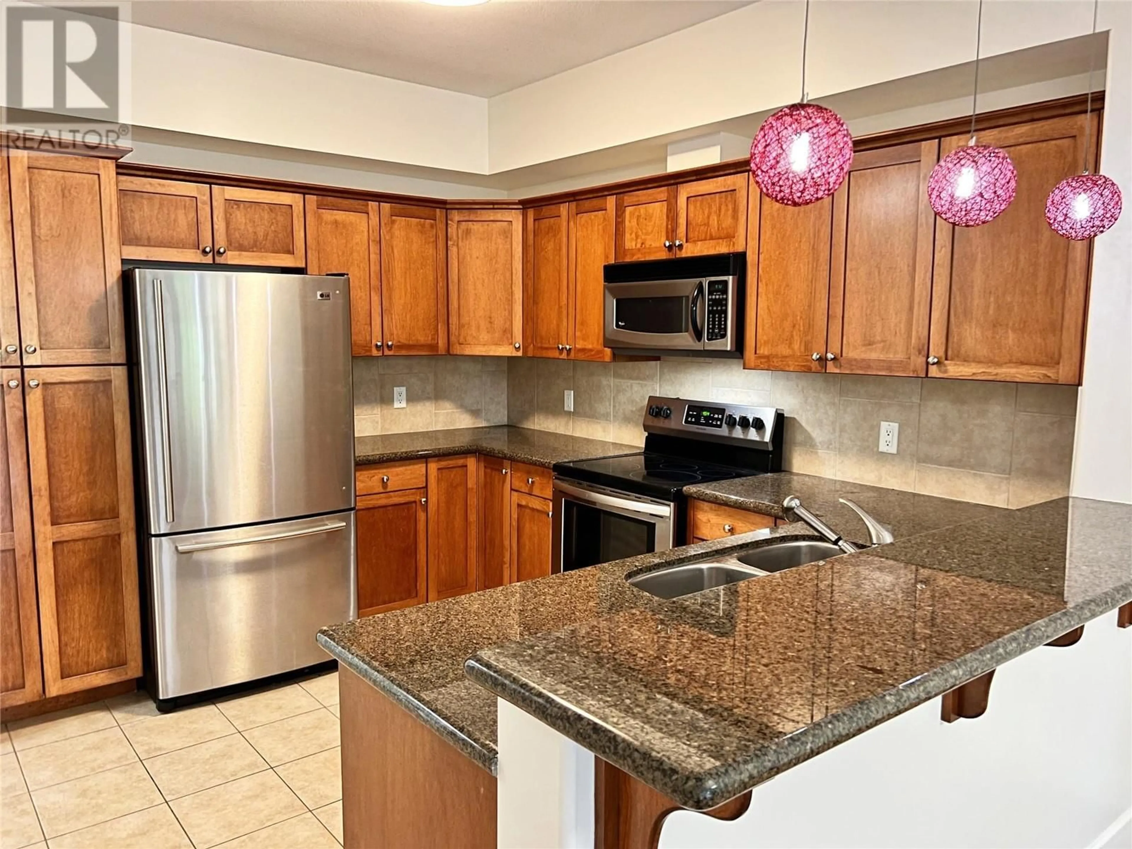 Standard kitchen, ceramic/tile floor for 3996 Beach Avenue Unit# 227, Peachland British Columbia V0H1X5