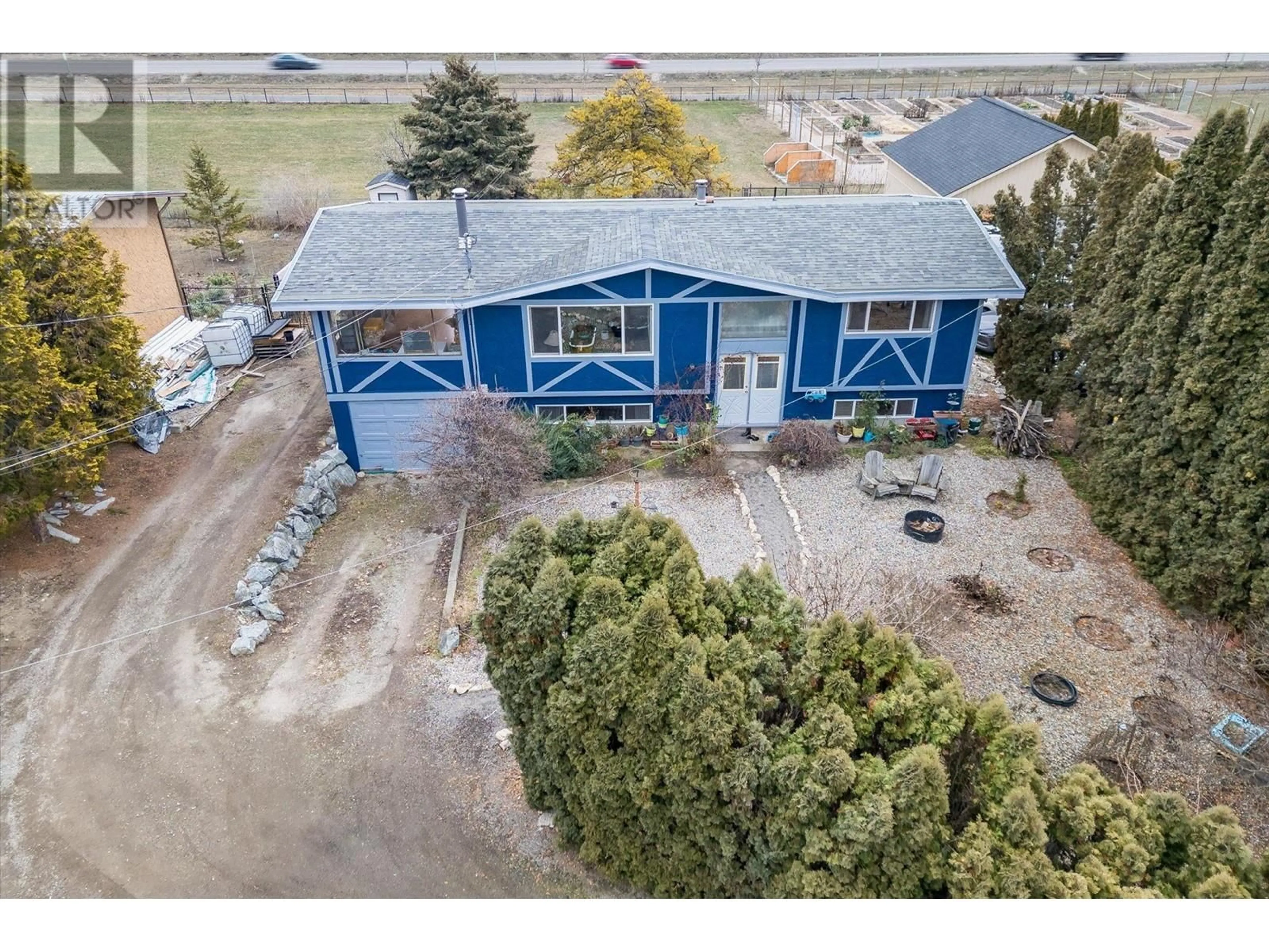 A pic from outside/outdoor area/front of a property/back of a property/a pic from drone, unknown for 189 Snowsell Street N, Kelowna British Columbia V1V2E3