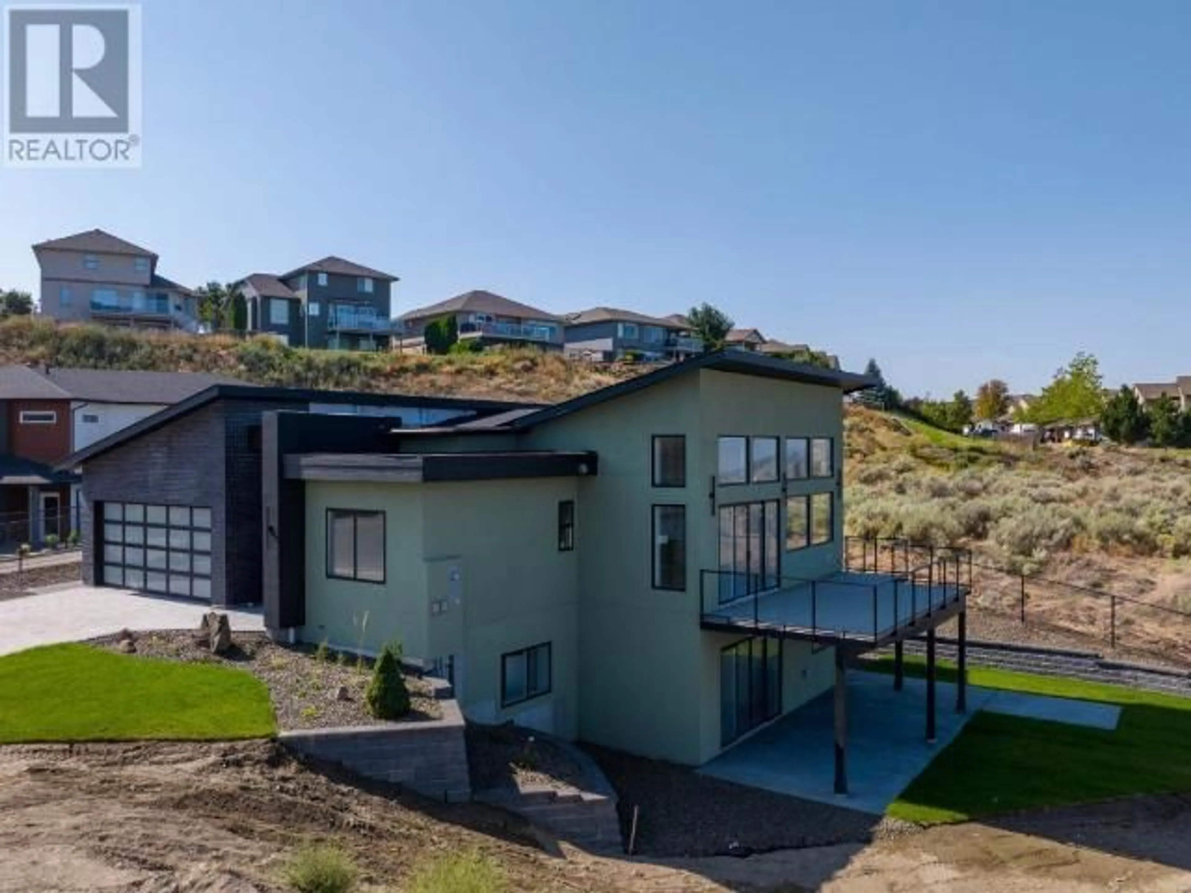 A pic from outside/outdoor area/front of a property/back of a property/a pic from drone, unknown for 2400 Talbot Place, Kamloops British Columbia V1S2B2