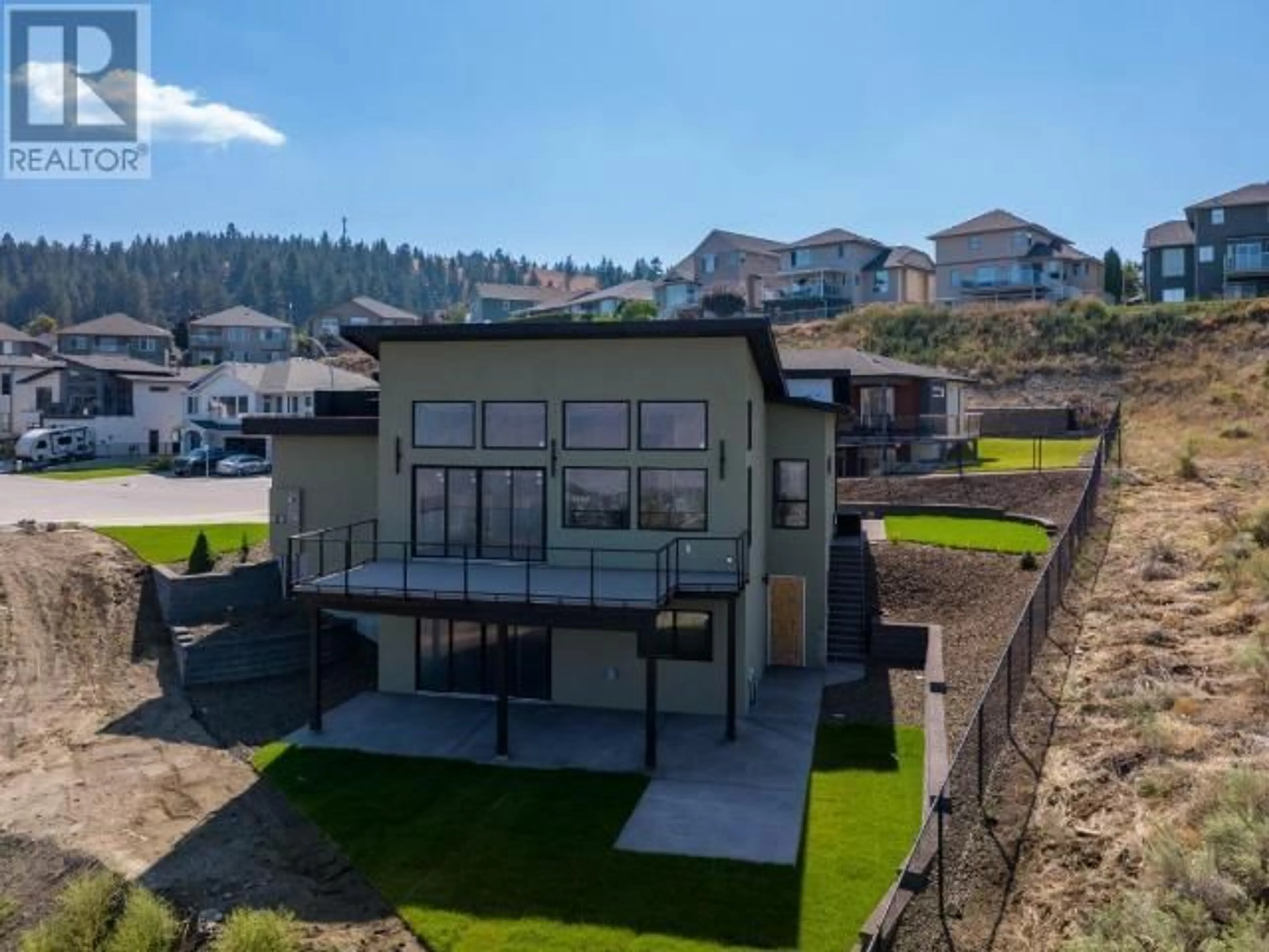 A pic from outside/outdoor area/front of a property/back of a property/a pic from drone, water/lake/river/ocean view for 2400 Talbot Place, Kamloops British Columbia V1S2B2