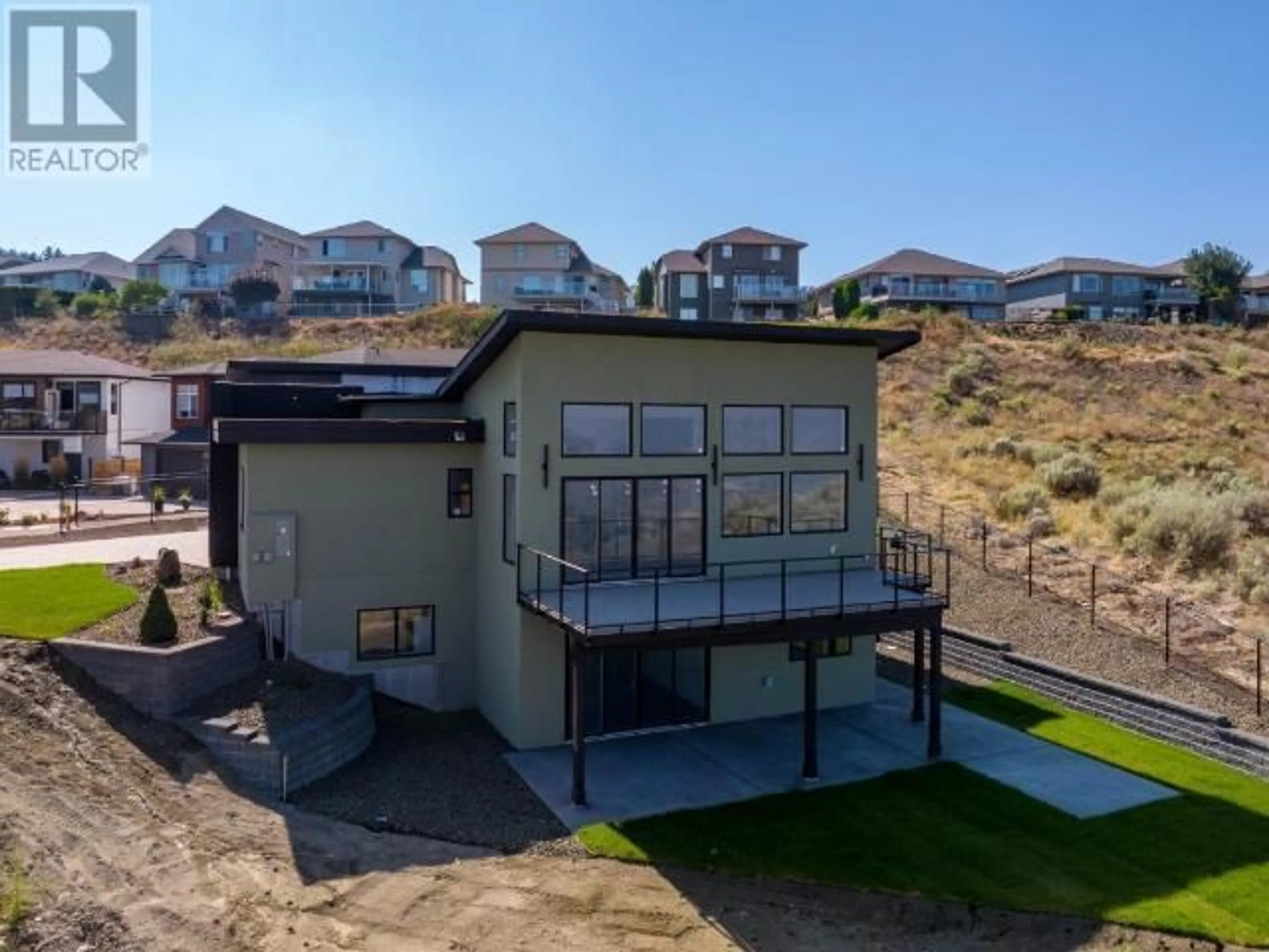 A pic from outside/outdoor area/front of a property/back of a property/a pic from drone, water/lake/river/ocean view for 2400 Talbot Place, Kamloops British Columbia V1S2B2