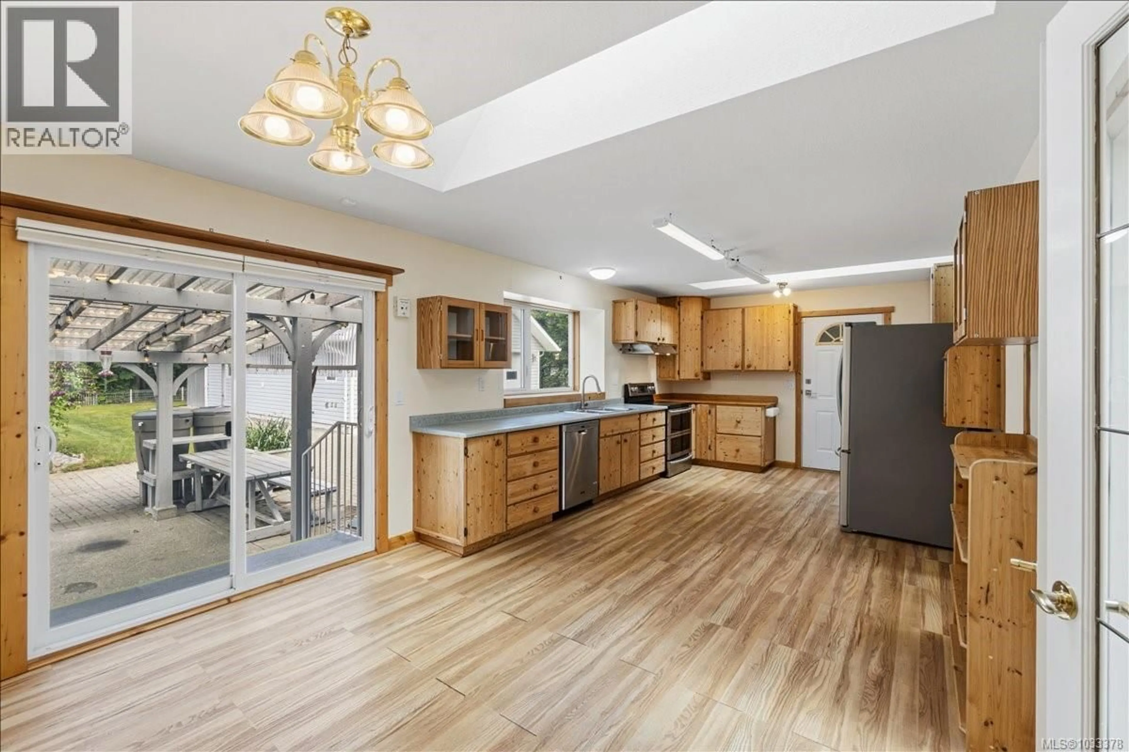 Open concept kitchen, unknown for 7080 BLACKJACK DRIVE, Lantzville British Columbia V0R2H0