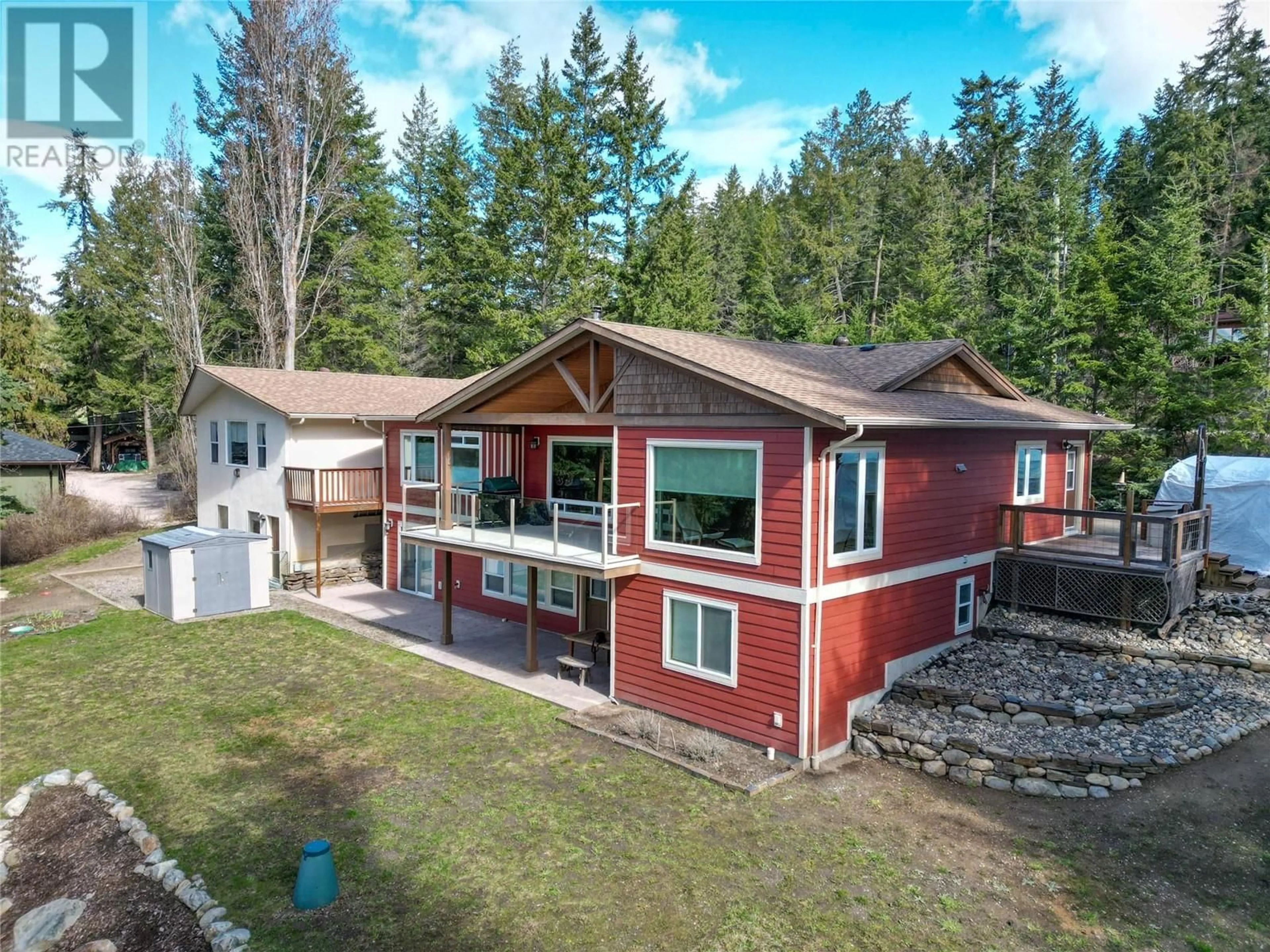 A pic from outside/outdoor area/front of a property/back of a property/a pic from drone, unknown for 7868 WALLACE ROAD, Vernon British Columbia V1B3N2