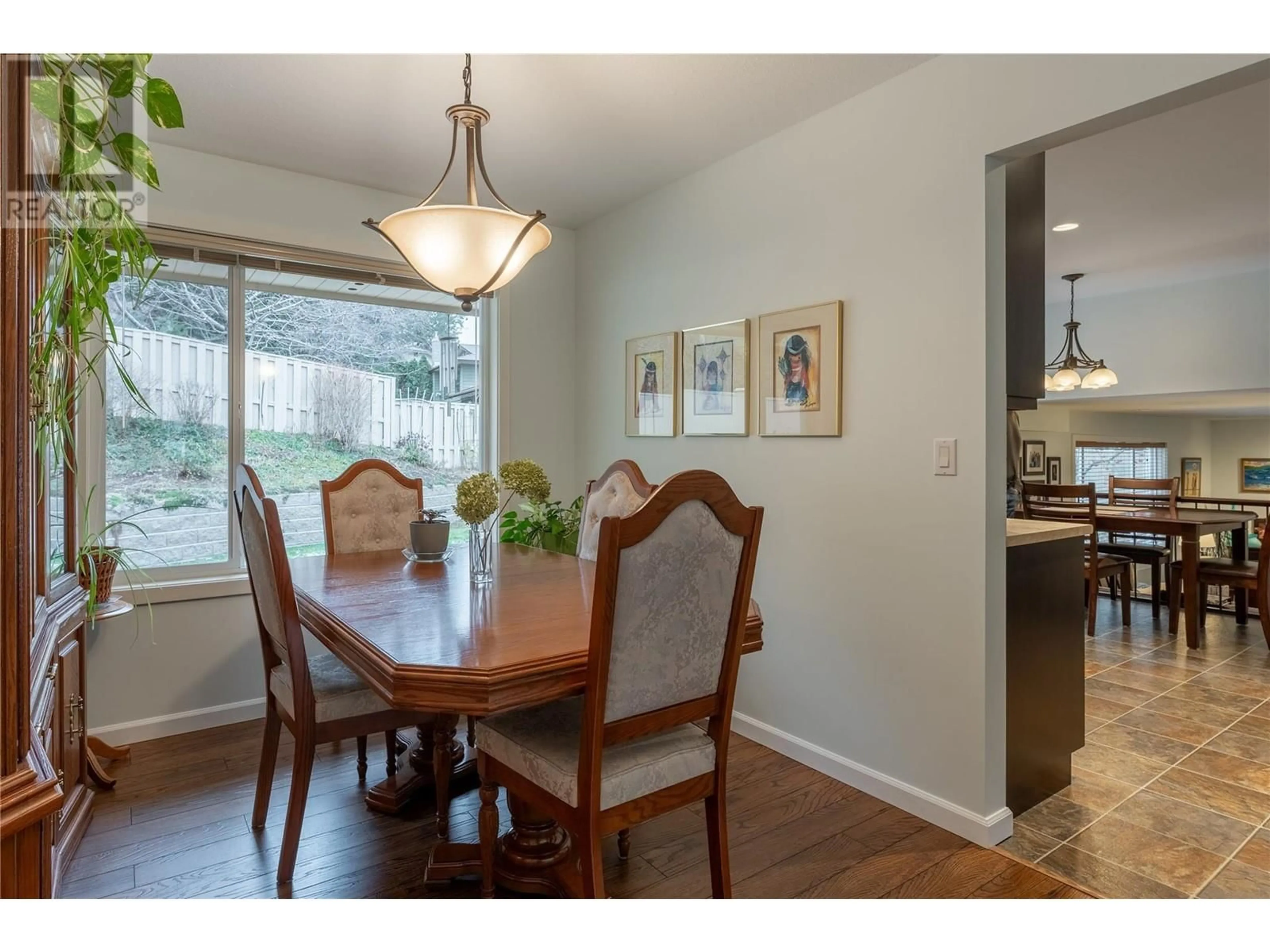 Dining room, wood/laminate floor for 1060 Marathon Court, West Kelowna British Columbia V1Z3H9