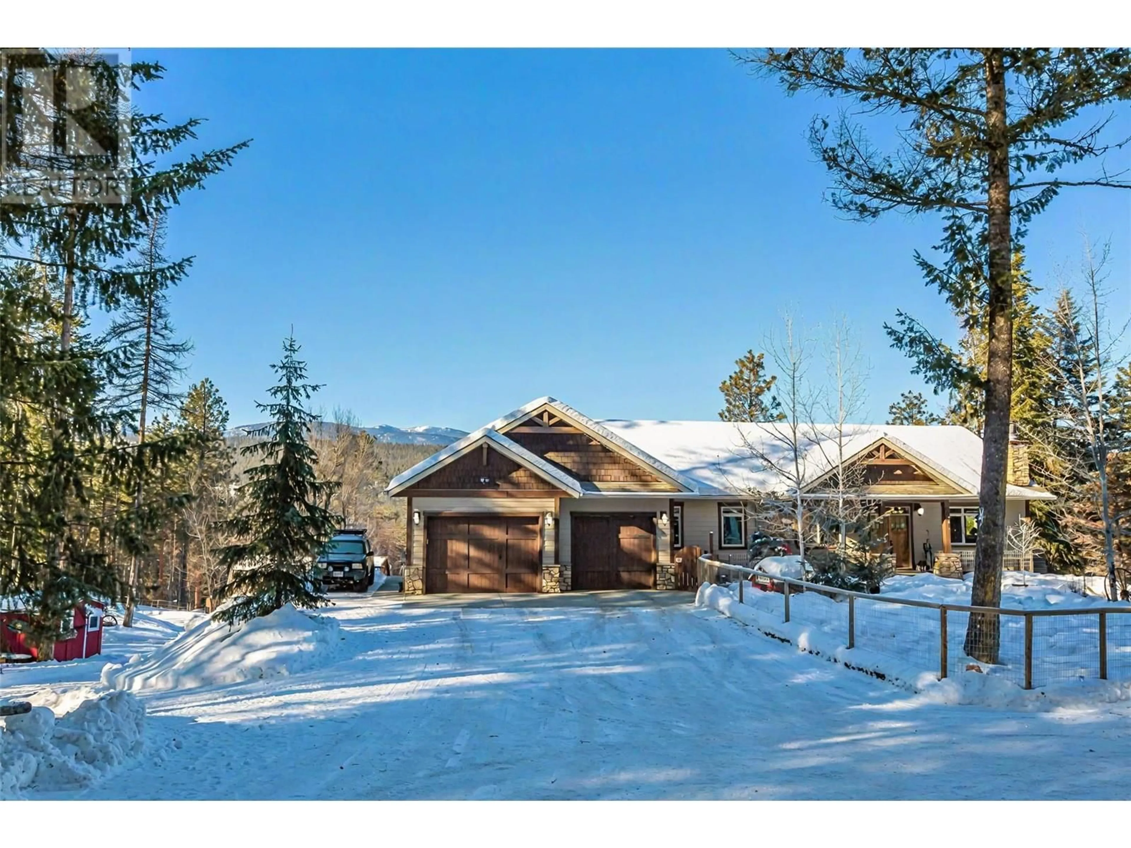 A pic from outside/outdoor area/front of a property/back of a property/a pic from drone, mountain view for 3749 SILVER SPRING Drive, Cranbrook British Columbia V1C6X8