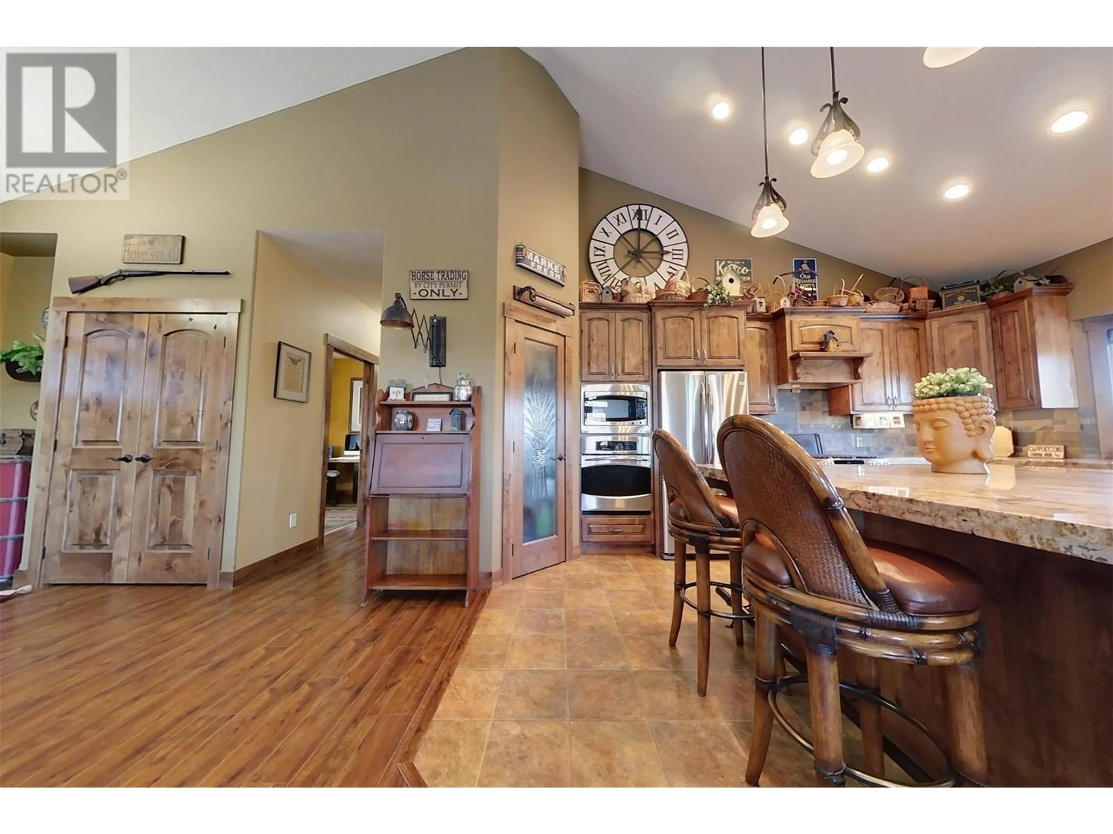 Open concept kitchen, wood/laminate floor for 3749 SILVER SPRING Drive, Cranbrook British Columbia V1C6X8