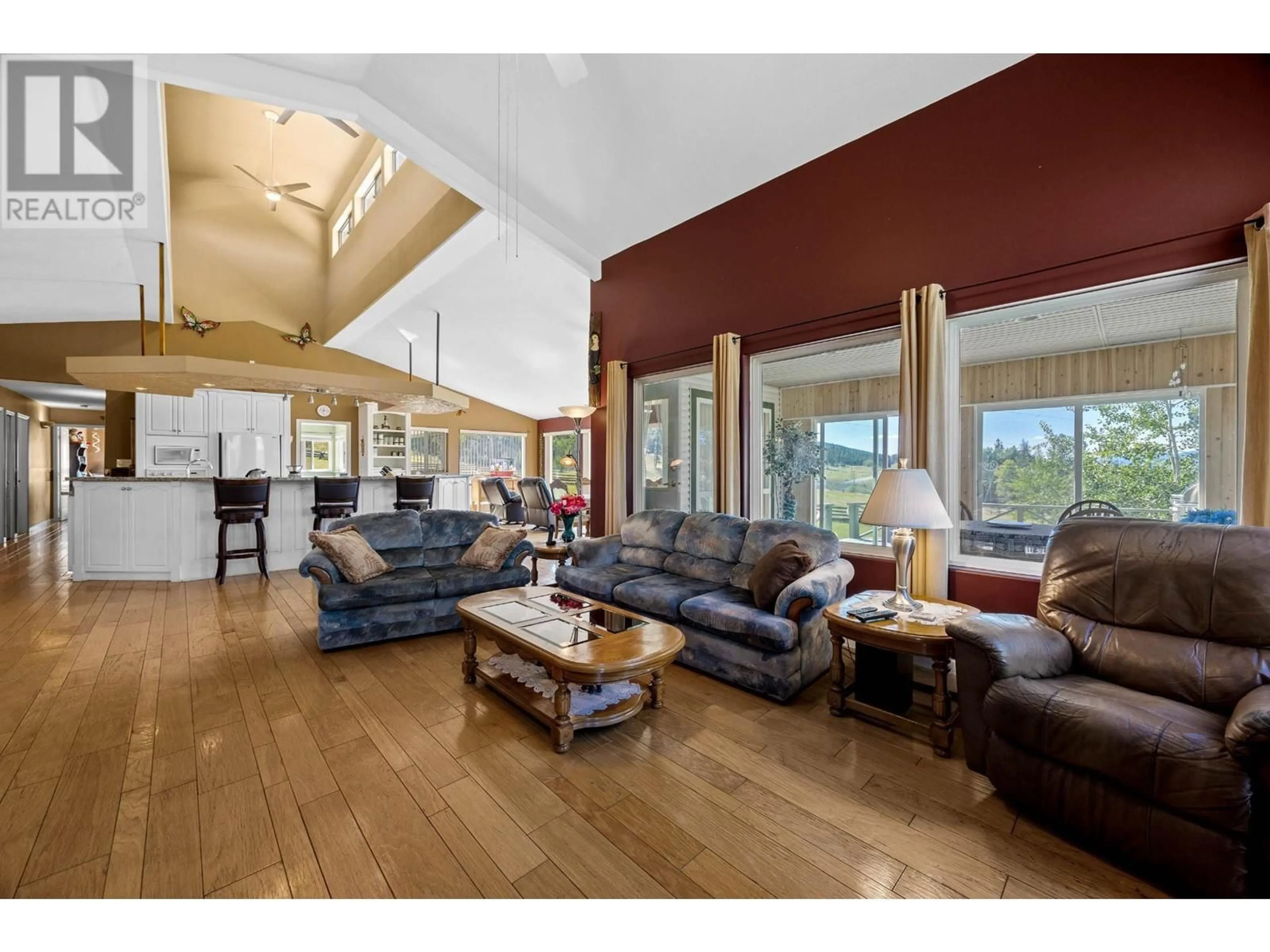 Living room with furniture, wood/laminate floor for 5120 STEFFENS ROAD, Merritt British Columbia V1K1B8