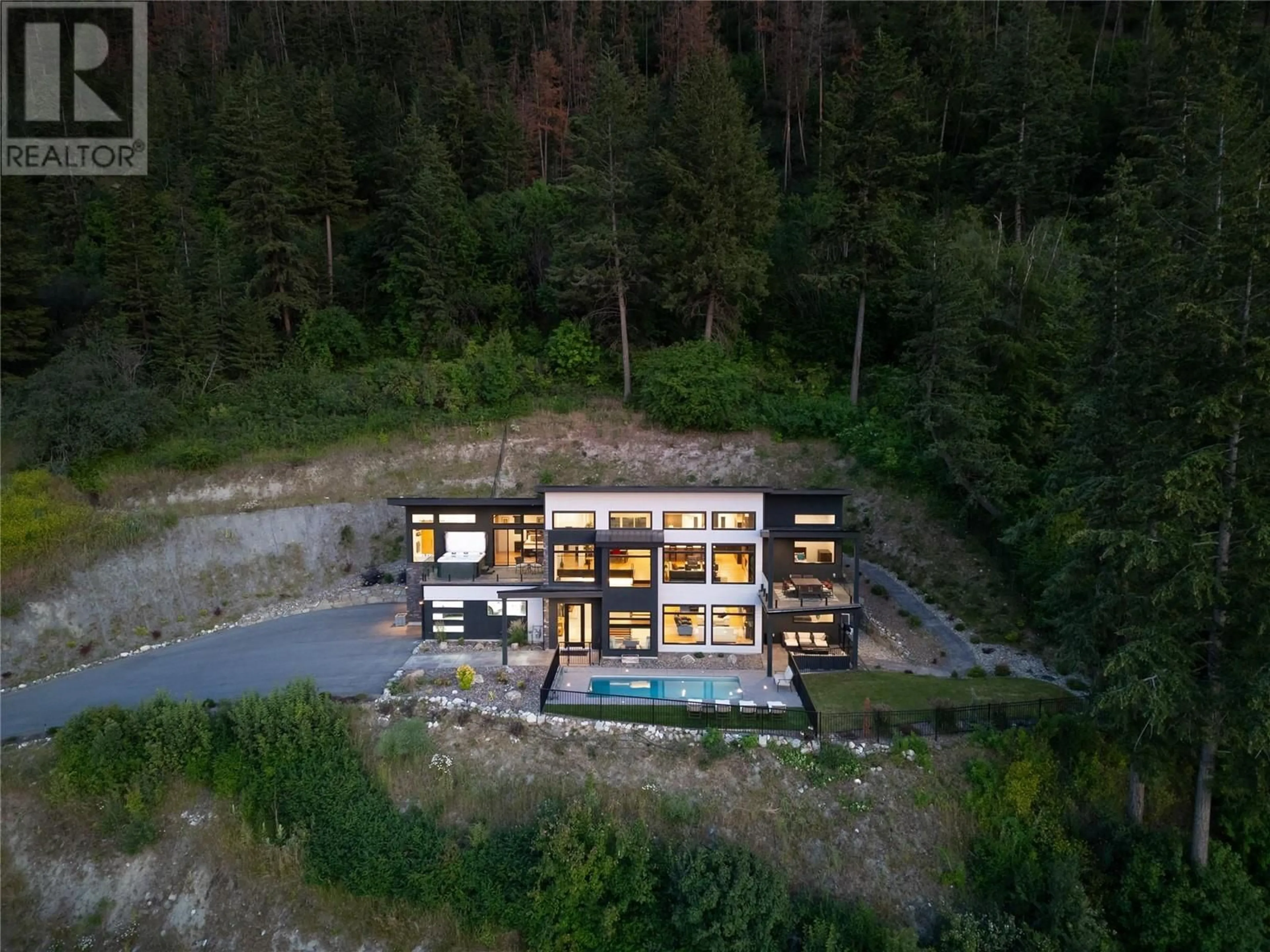 A pic from outside/outdoor area/front of a property/back of a property/a pic from drone, unknown for 132 Sunset Boulevard, Vernon British Columbia V1H1T7