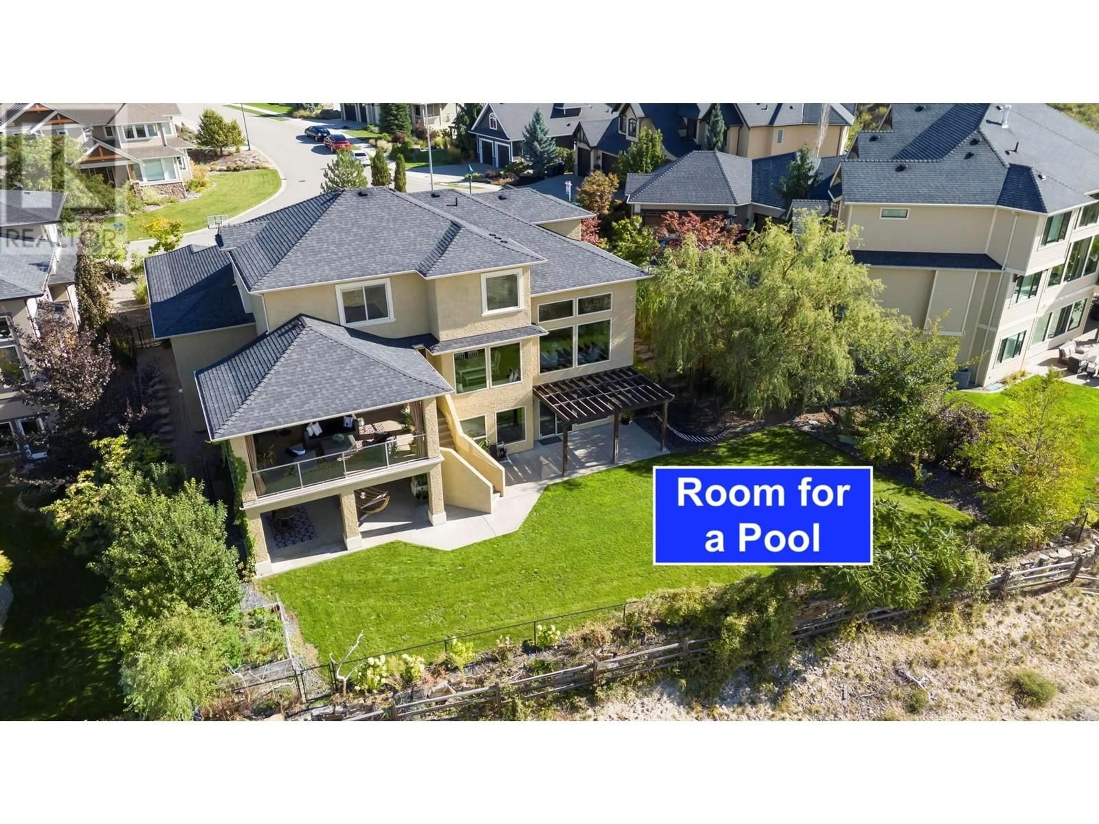 A pic from outside/outdoor area/front of a property/back of a property/a pic from drone, street for 369 Farron Court, Kelowna British Columbia V1W5H2