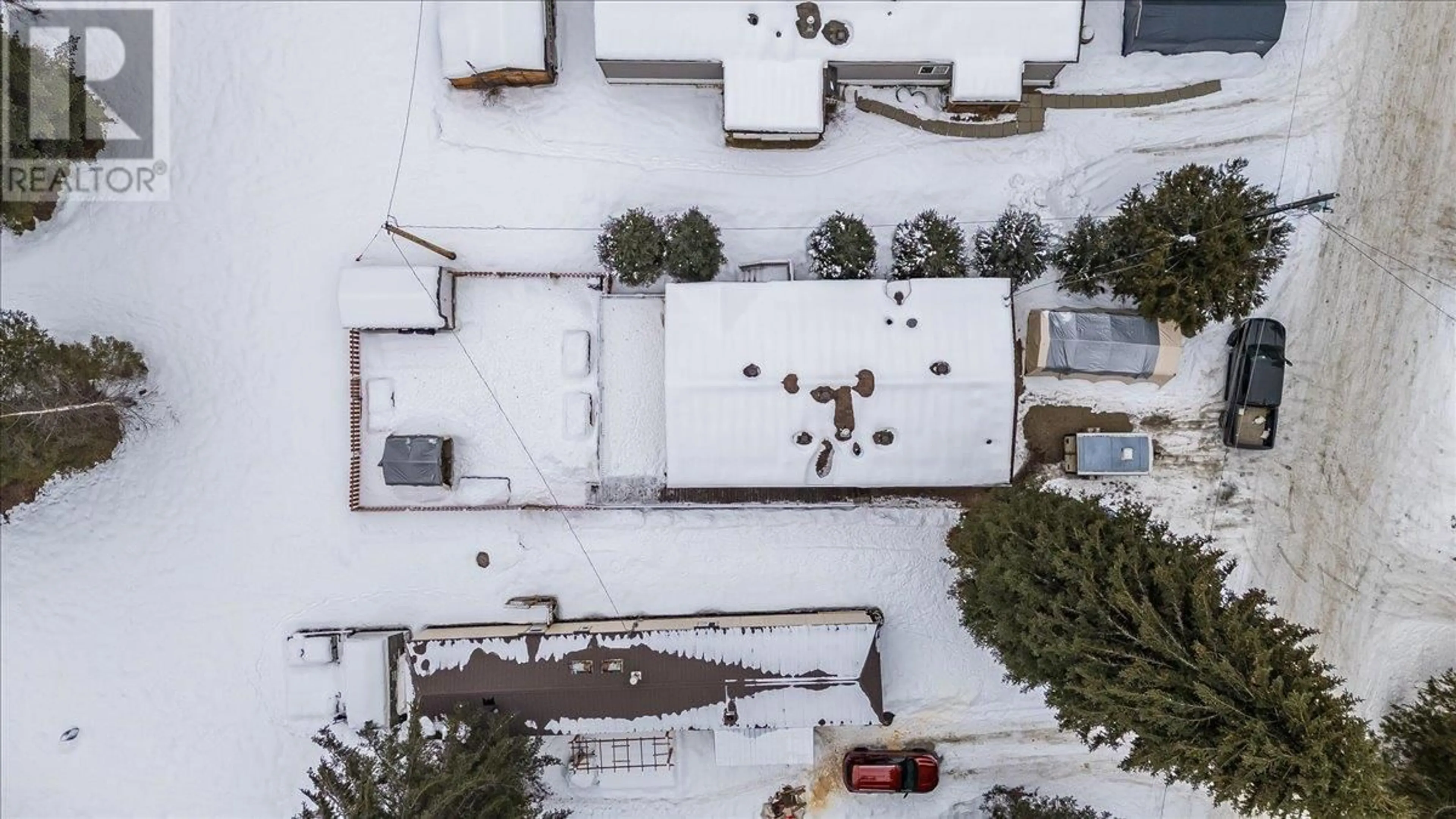 A pic from outside/outdoor area/front of a property/back of a property/a pic from drone, unknown for 10 - 916 AIRPORT ROAD HIGHWAY, Salmo British Columbia V0G1Z0