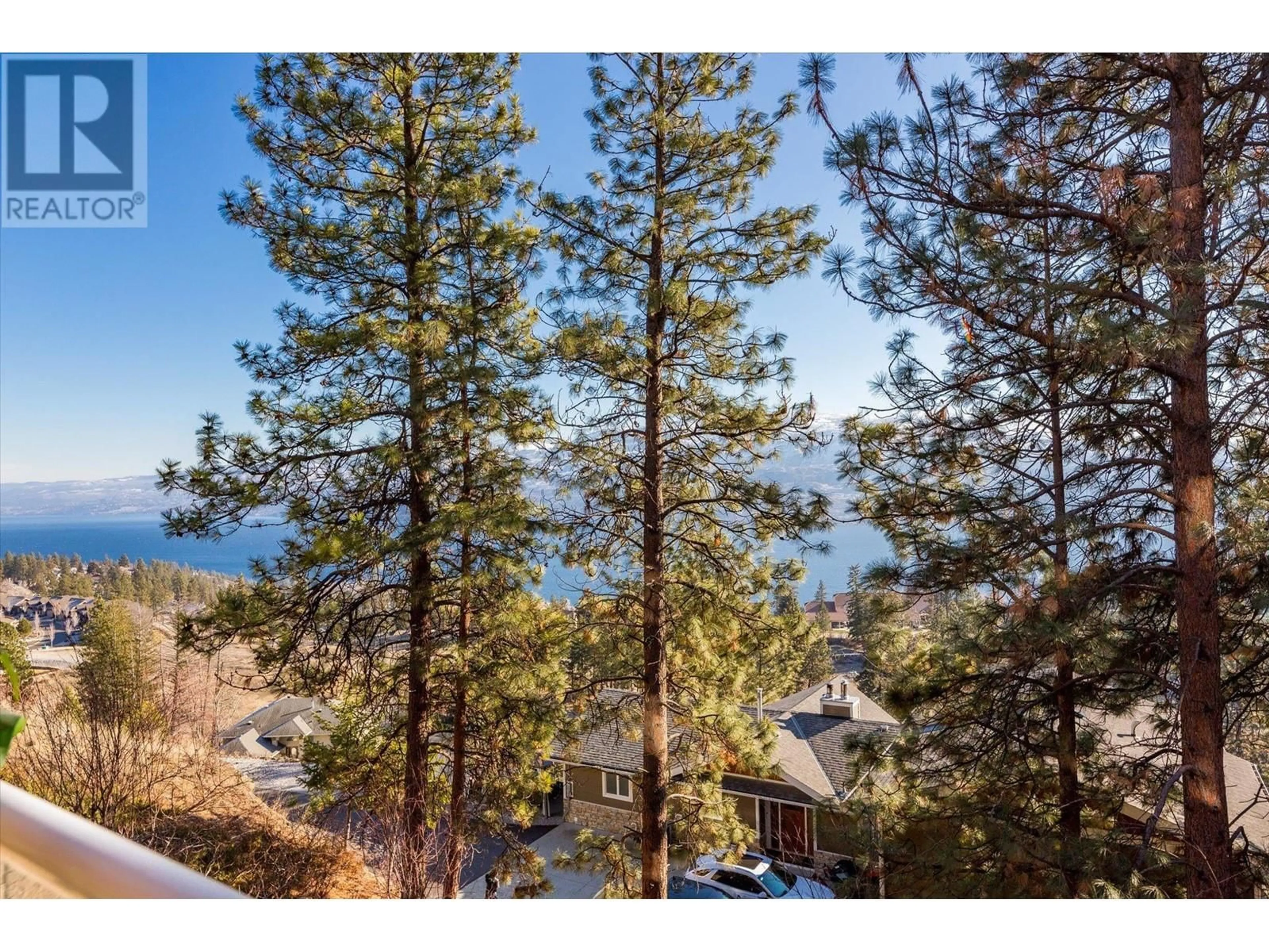 A pic from outside/outdoor area/front of a property/back of a property/a pic from drone, forest/trees view for 114 - 4630 PONDEROSA DRIVE, Peachland British Columbia V0H1X5