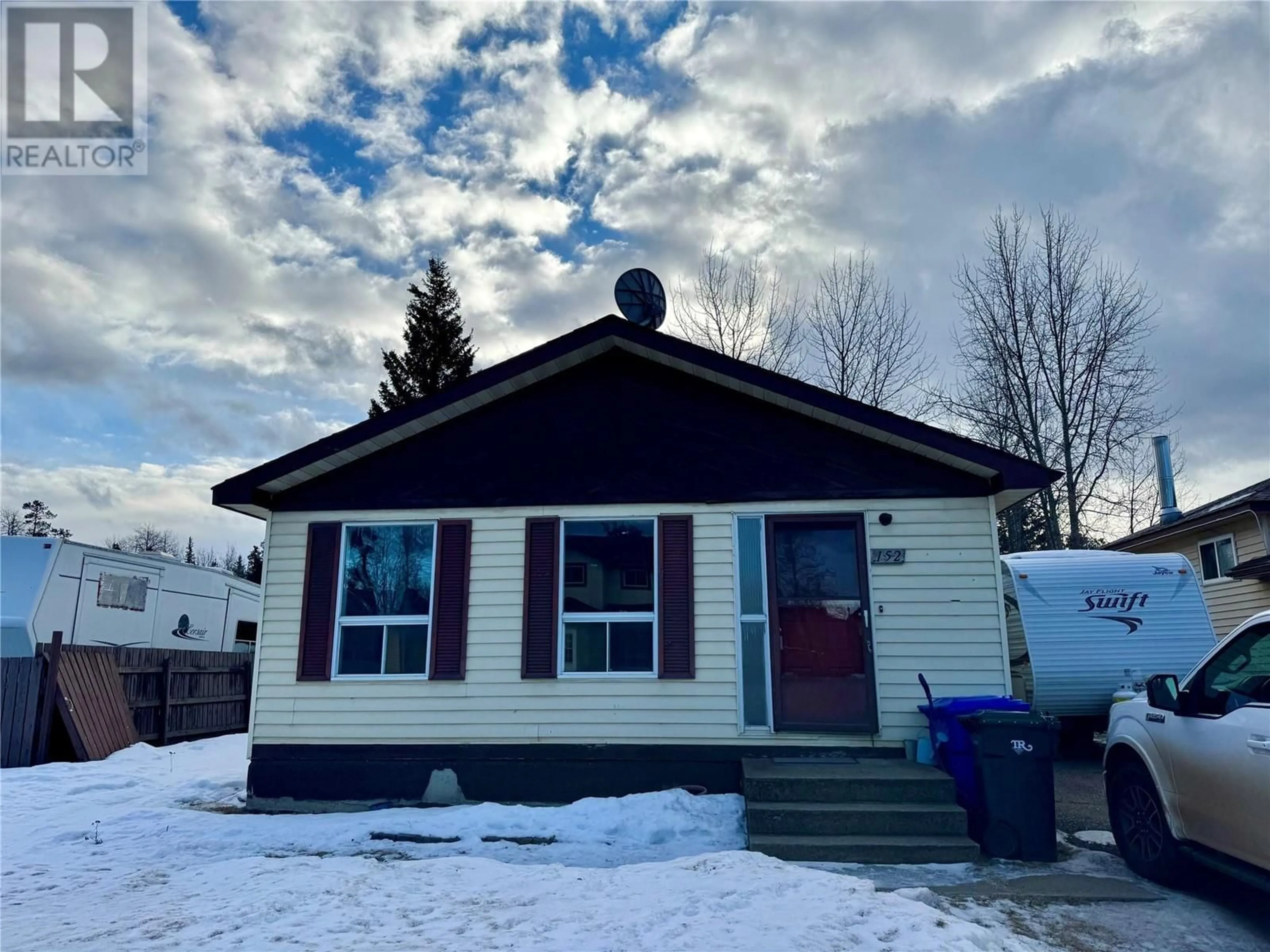 Home with vinyl exterior material, street for 152 Spieker Avenue, Tumbler Ridge British Columbia V0C2W0