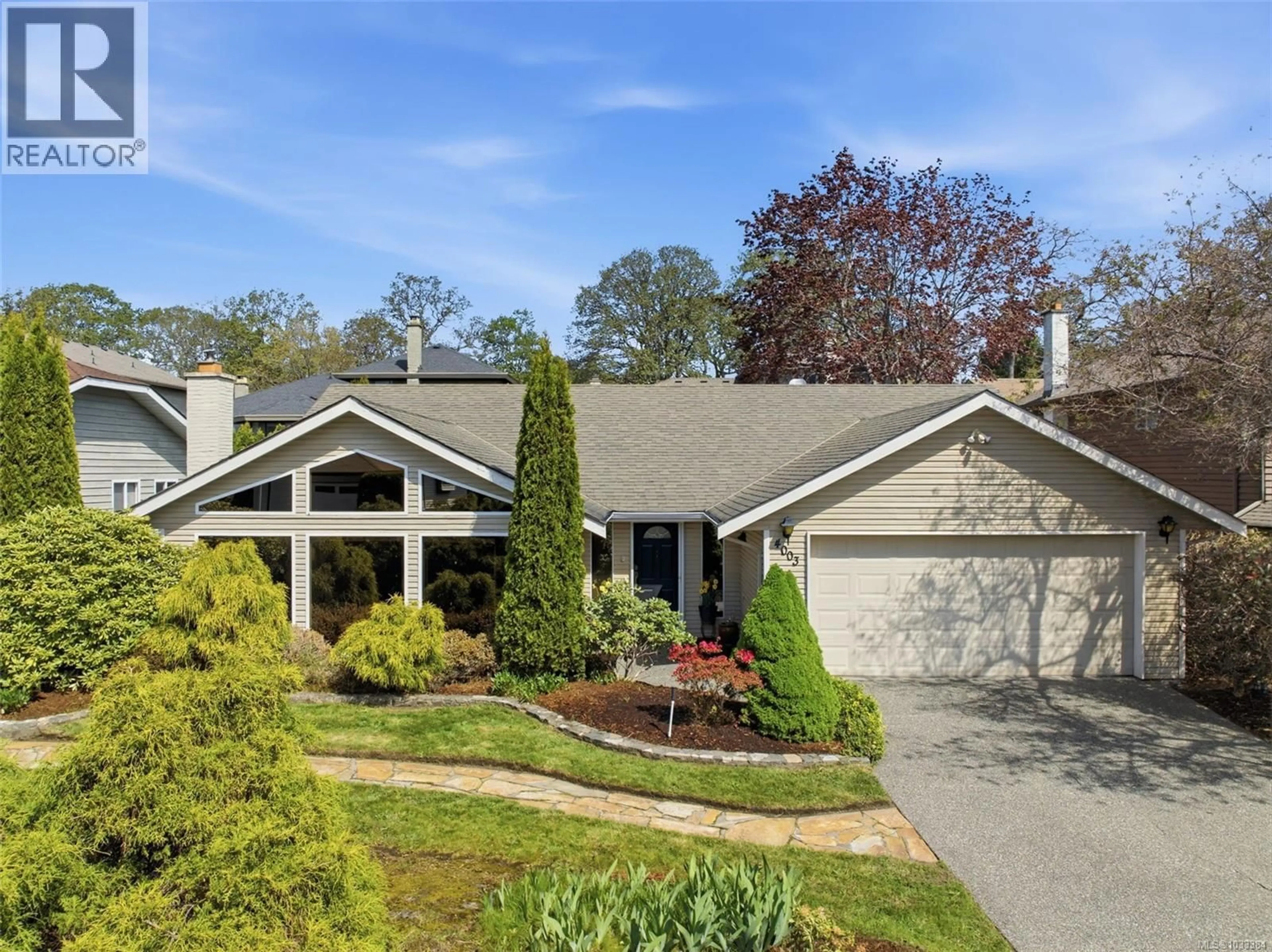 Home with vinyl exterior material, street for 4003 HOPESMORE DRIVE, Saanich British Columbia V8N6A3