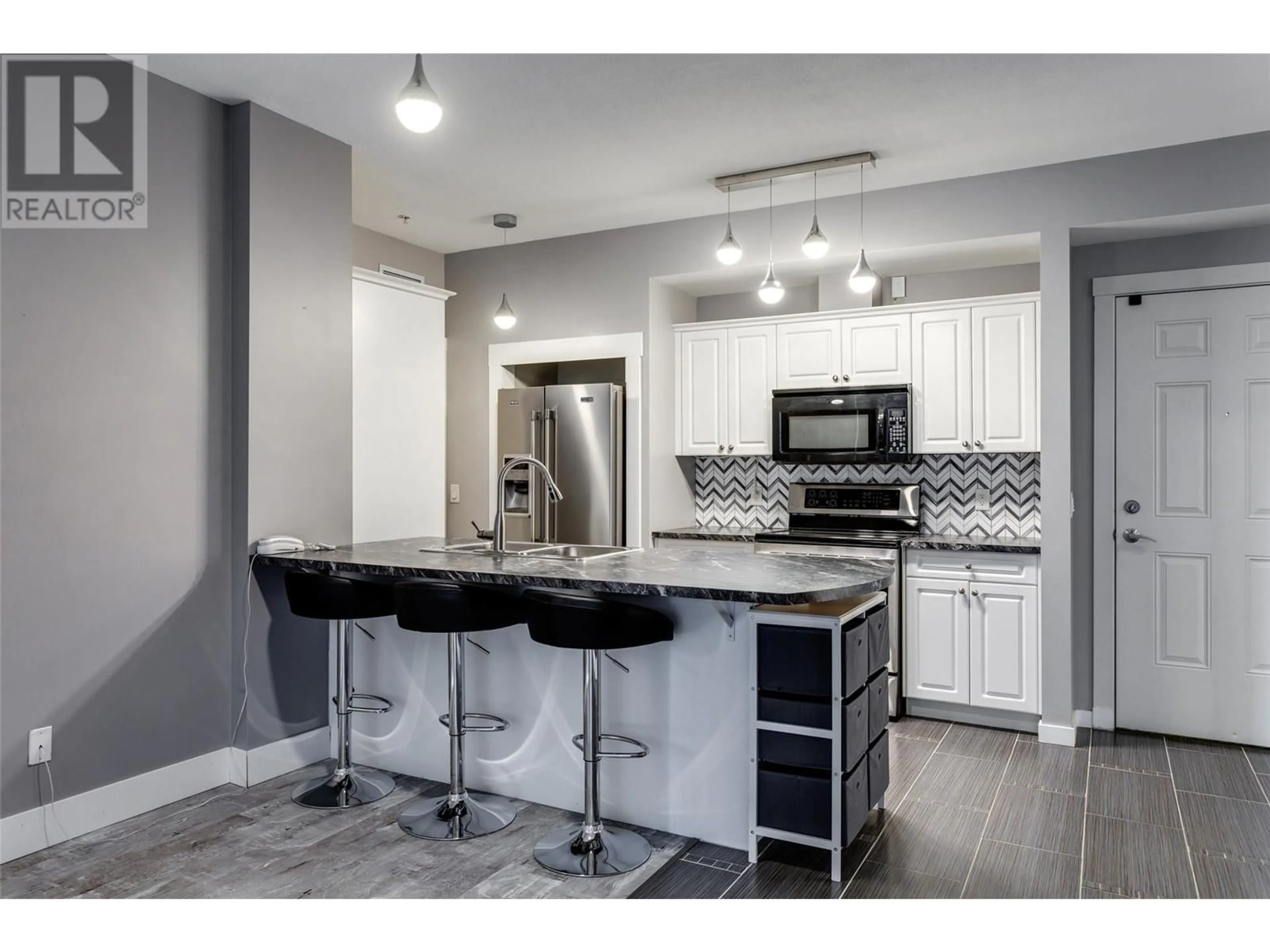Open concept kitchen, unknown for 110 - 3550 WOODSDALE ROAD, Lake Country British Columbia V4V2P5