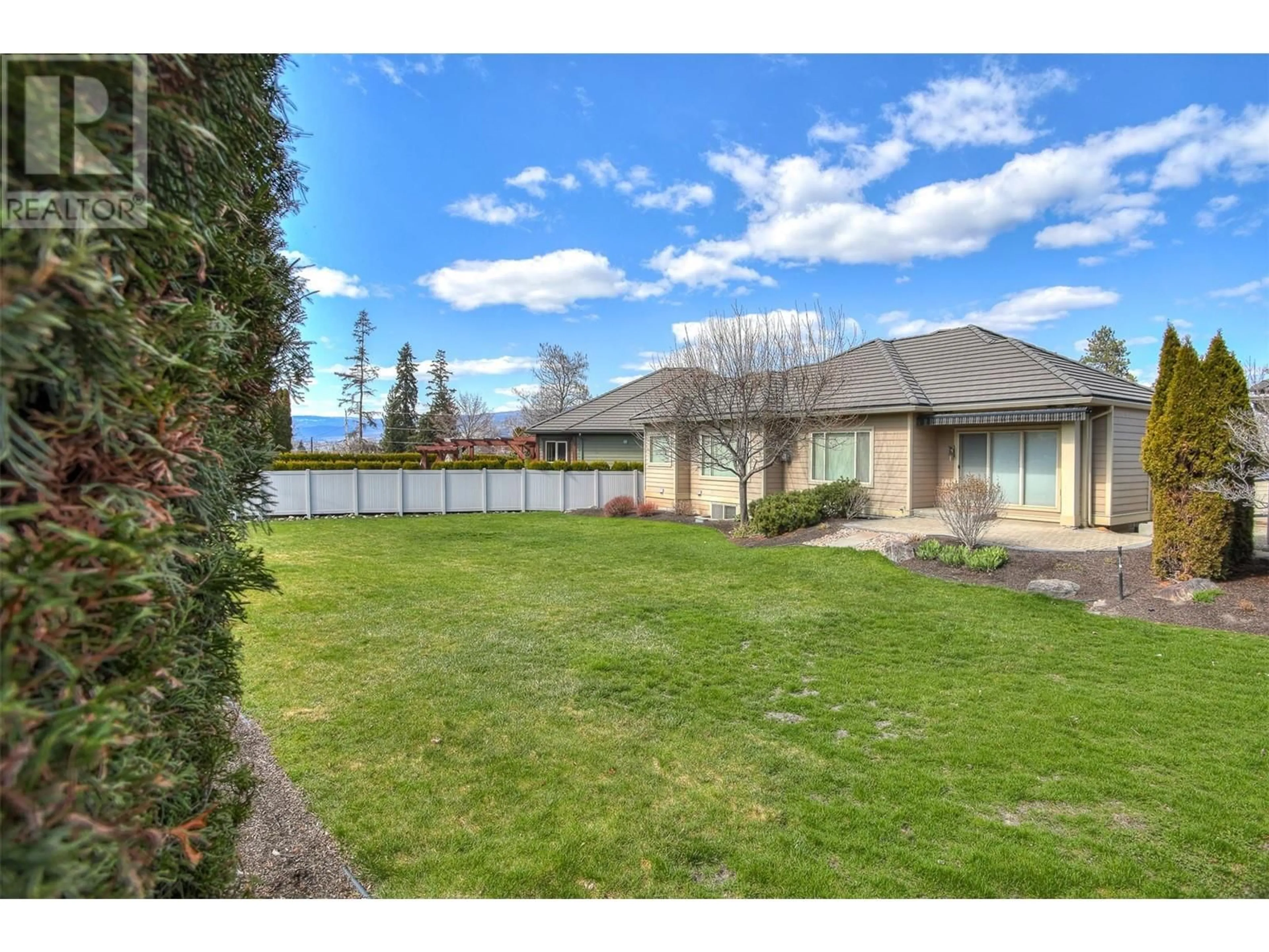 A pic from outside/outdoor area/front of a property/back of a property/a pic from drone, unknown for 143 - 4450 GORDON DRIVE, Kelowna British Columbia V1W1T1