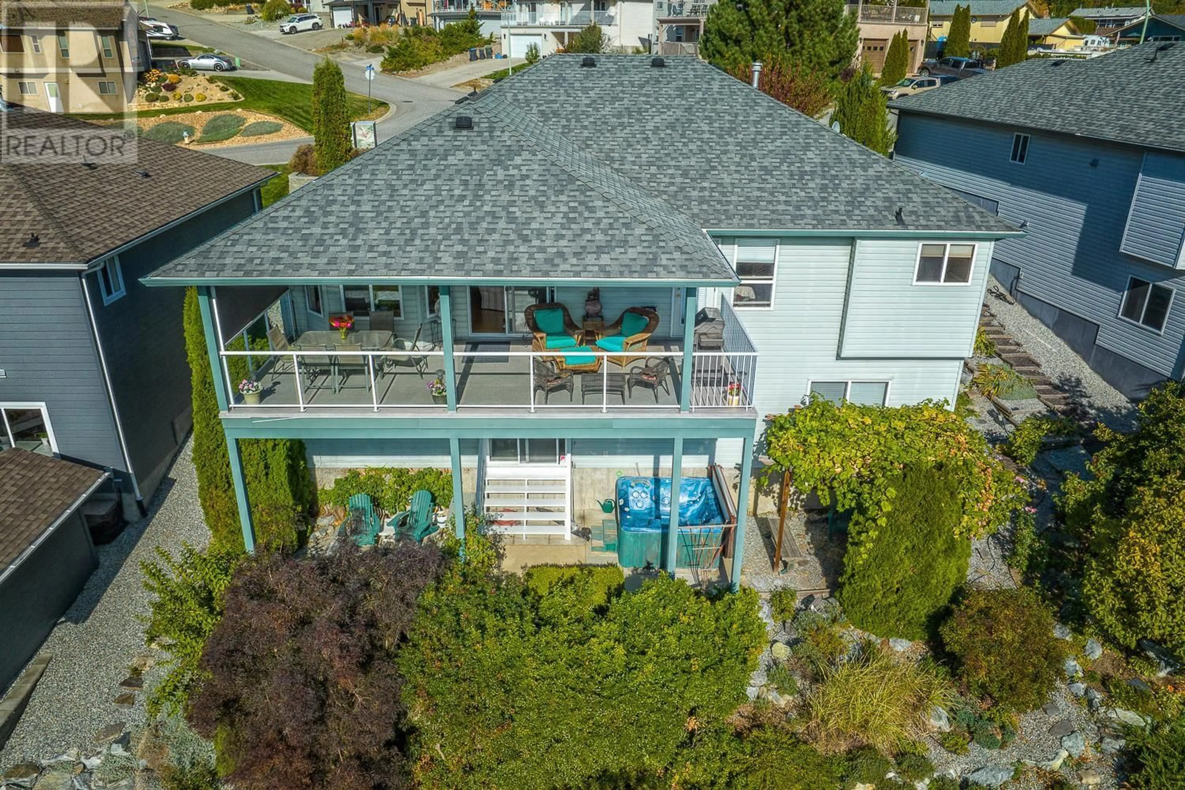 A pic from outside/outdoor area/front of a property/back of a property/a pic from drone, water/lake/river/ocean view for 1681 Large Avenue, Kelowna British Columbia V1P1M9