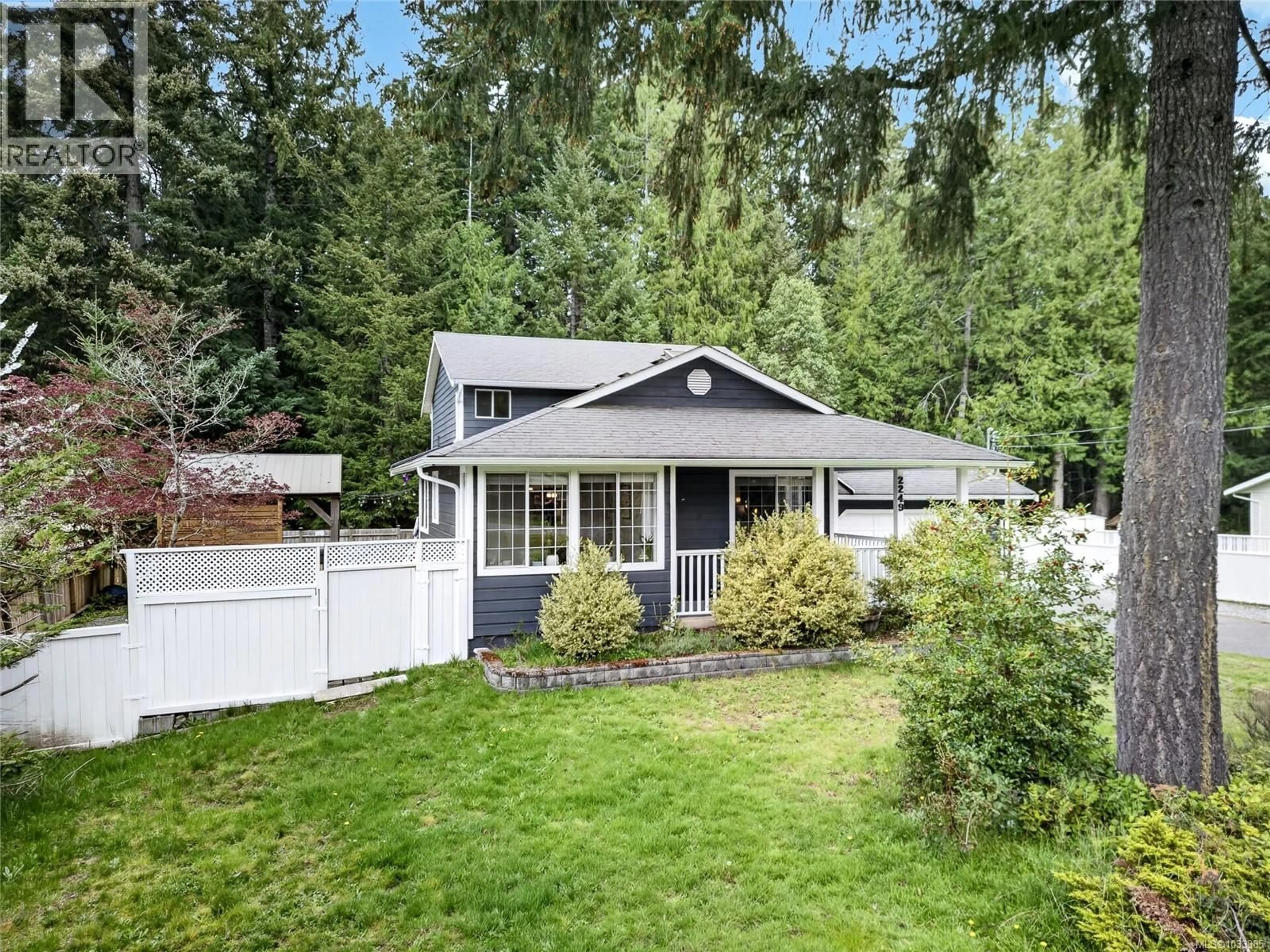 Home with vinyl exterior material, street for 2249 MCINTOSH ROAD, Shawnigan Lake British Columbia V0R2W1