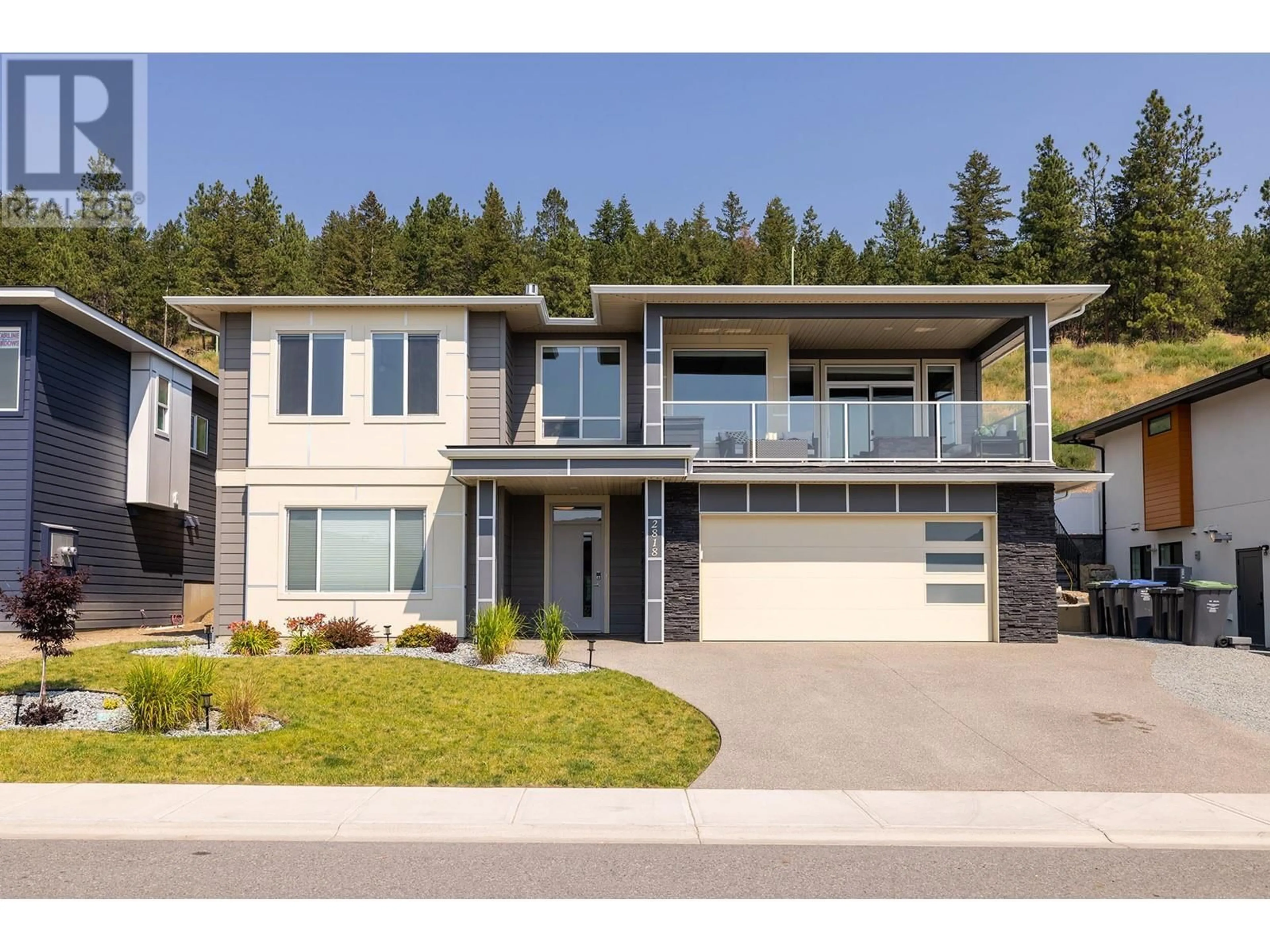 Home with vinyl exterior material, street for 2818 Copper Ridge Drive, West Kelowna British Columbia V4T0E7