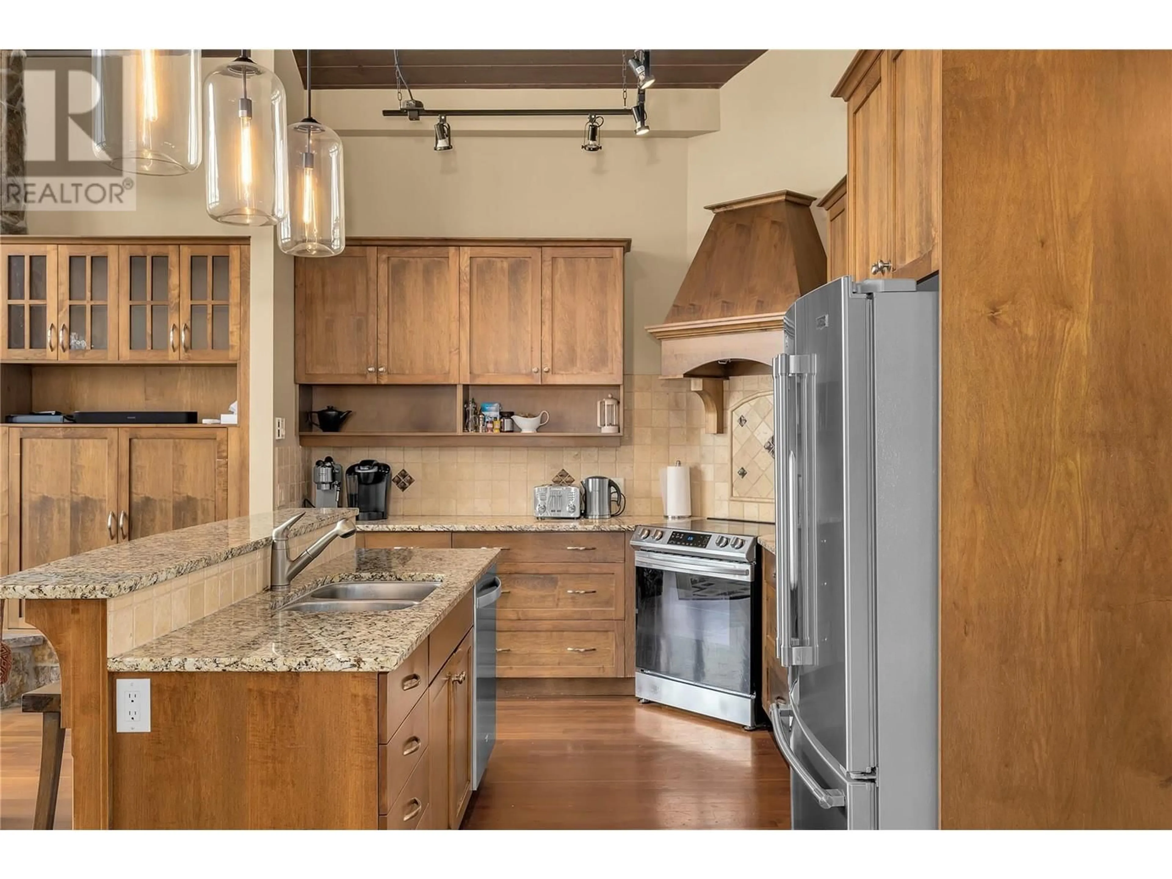 Open concept kitchen, unknown for 5095 Snowbird Way Unit# 26, Big White British Columbia V1P1P3