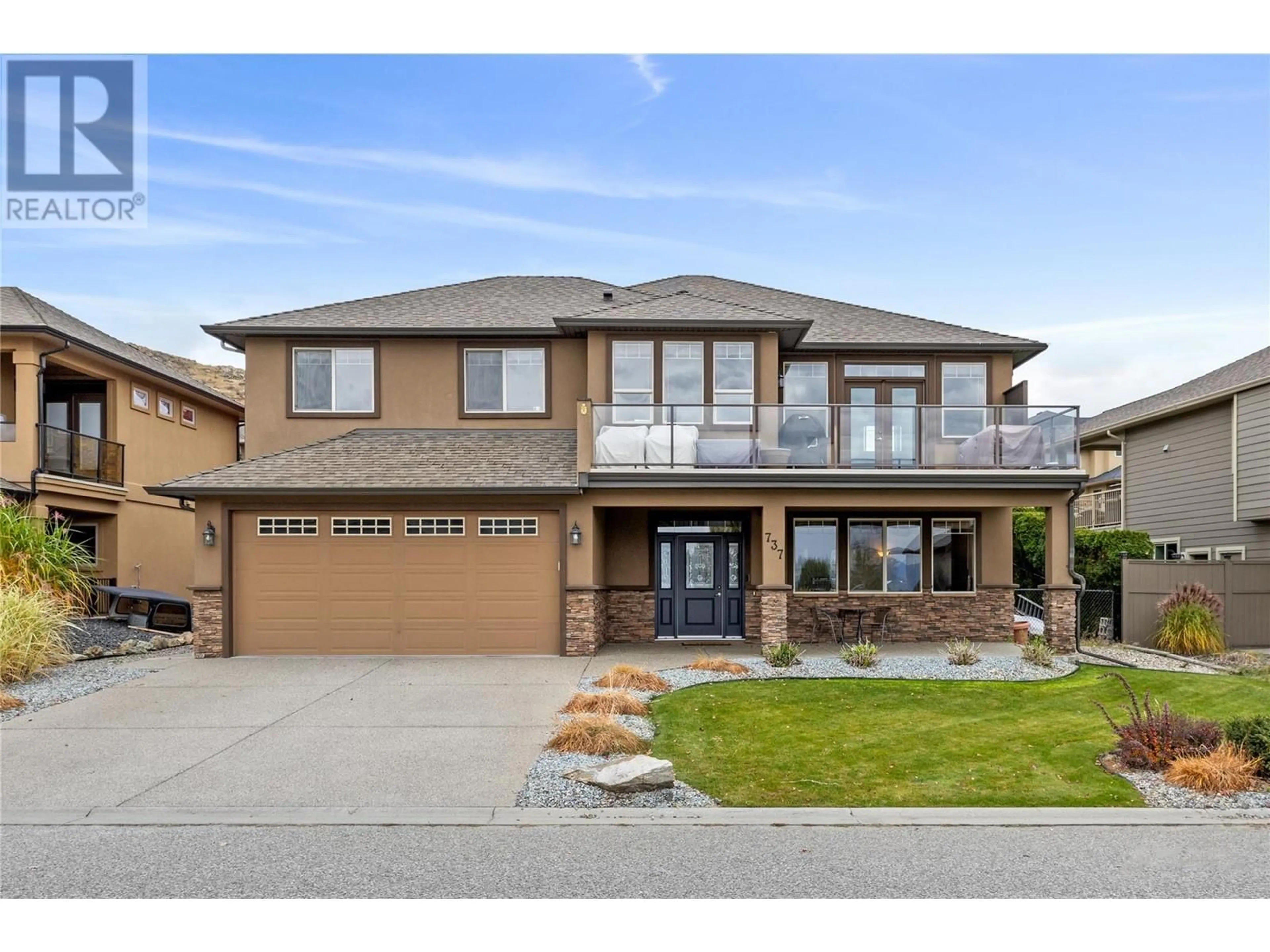 Home with brick exterior material, street for 737 Kuipers Crescent, Kelowna British Columbia V1W5H4