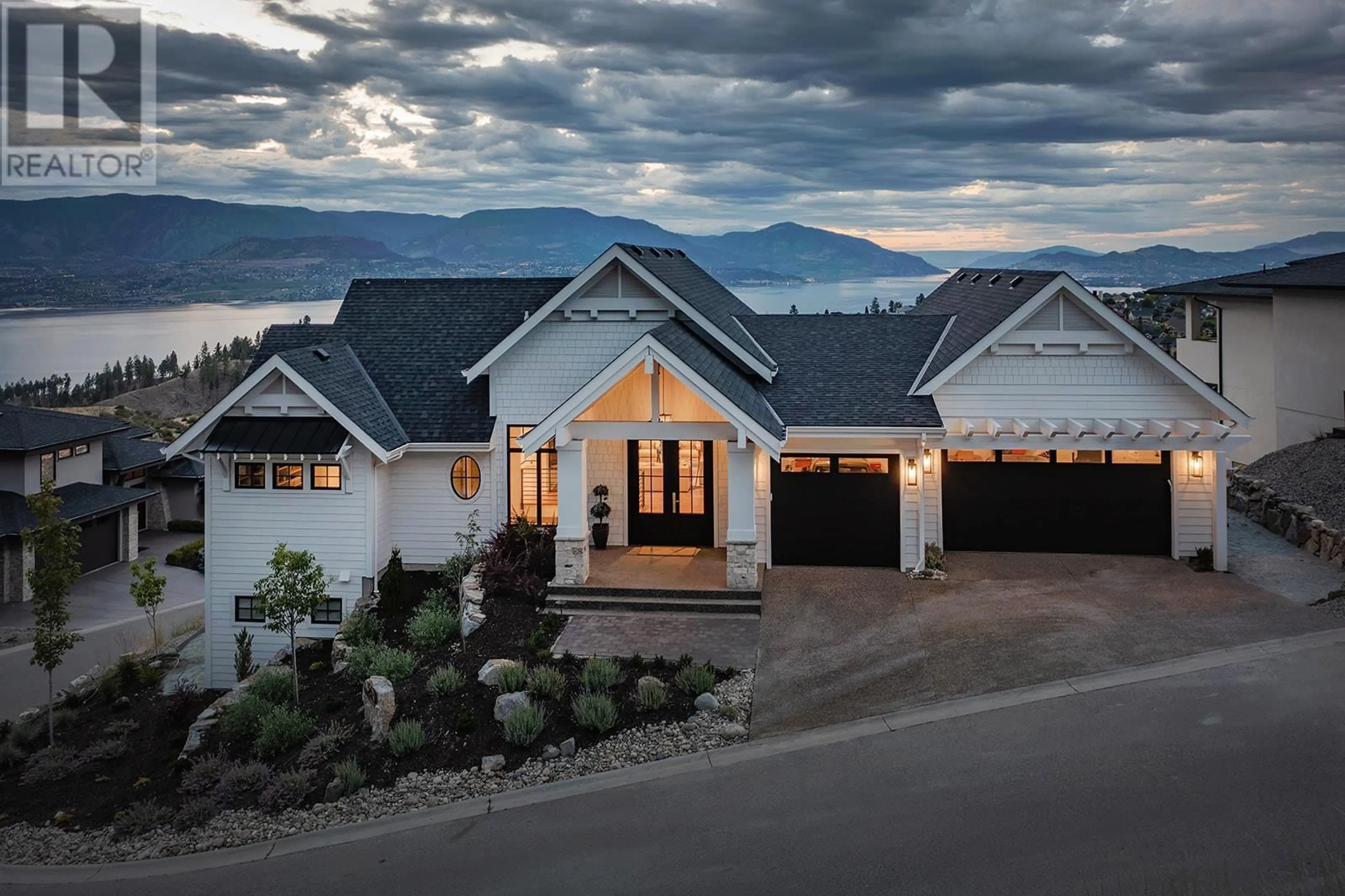 Home with vinyl exterior material, mountain view for 5670 Mountainside Court, Kelowna British Columbia V1W5L5