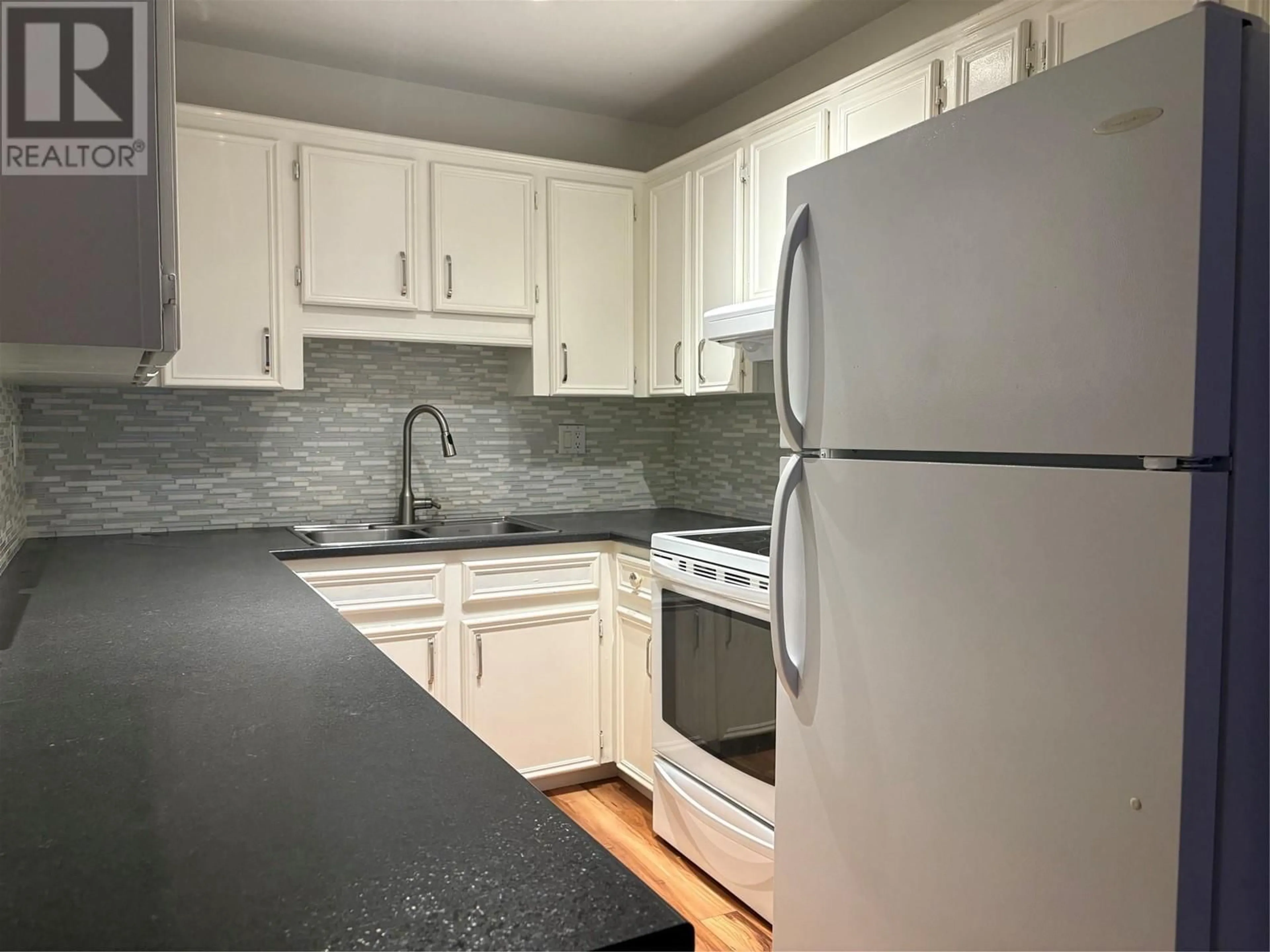 Standard kitchen, unknown for 3155 Gordon Drive Unit# 304, Kelowna British Columbia V1W3N6